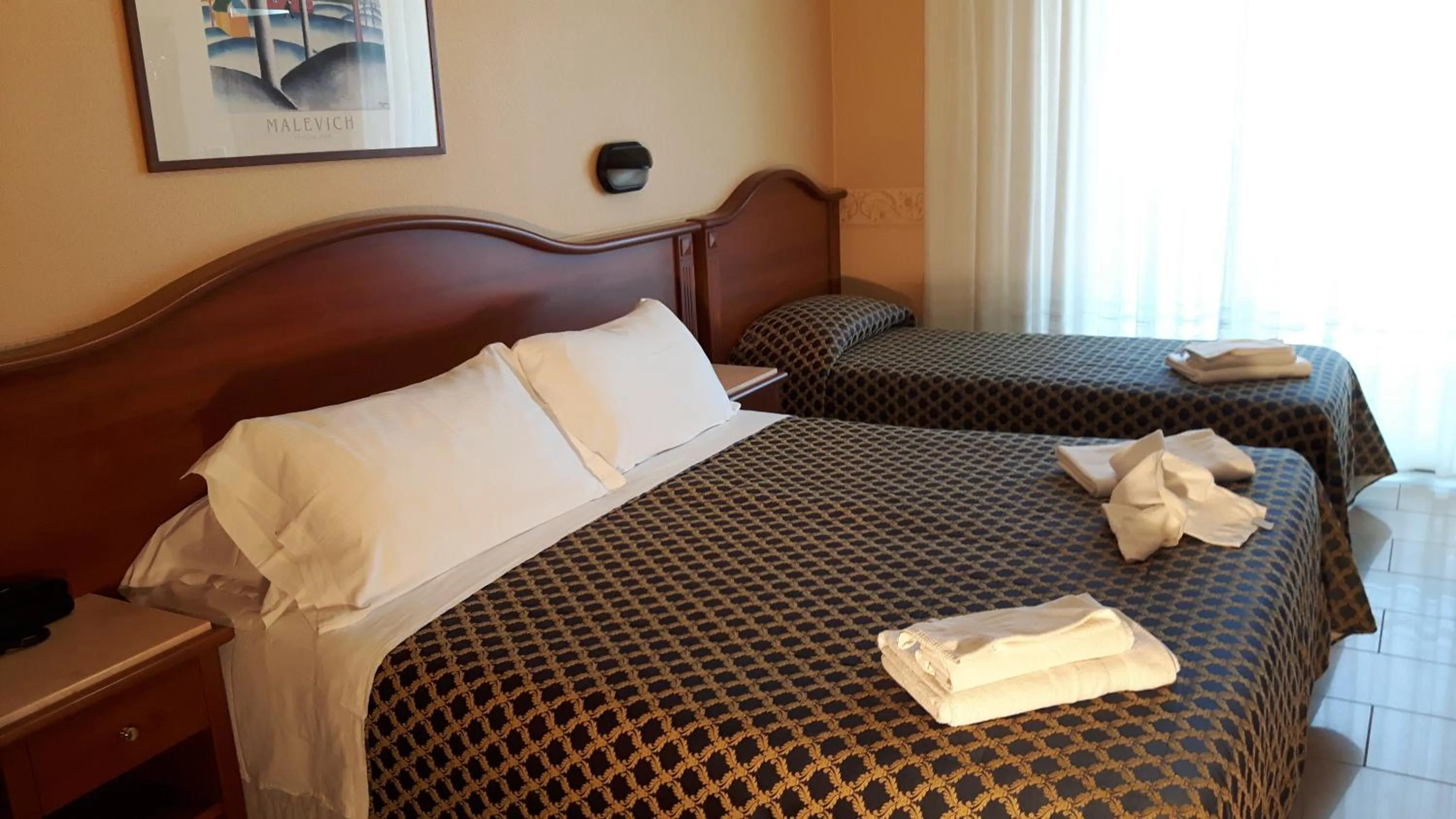 Bed in Hotel Grifone