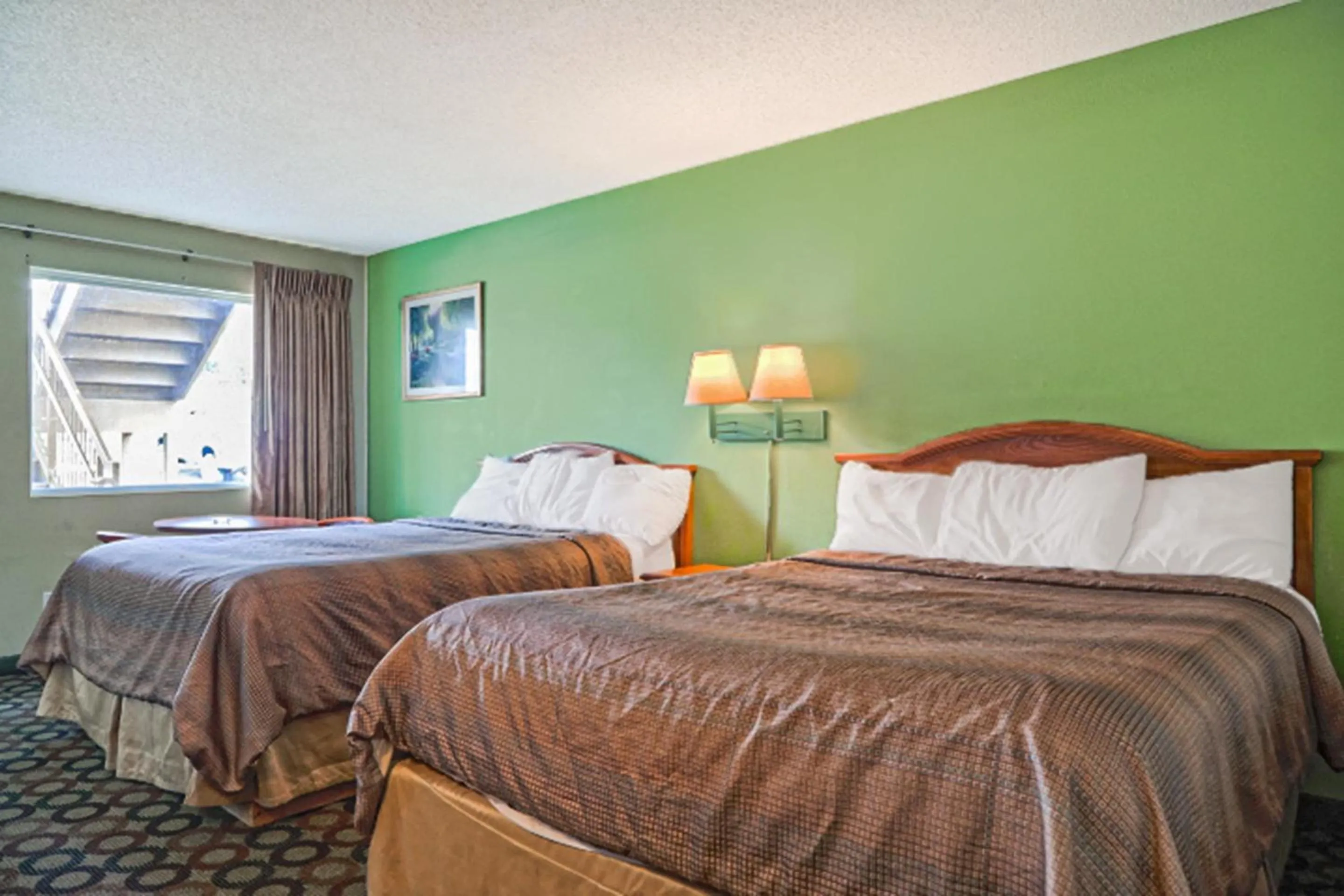 Bedroom, Bed in Economy Inn By OYO Ashburn