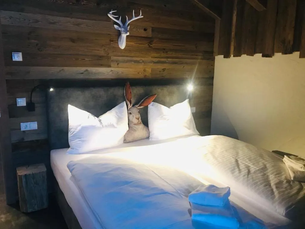 Bed in Sieglhub Chalets - Appartements - Hotel