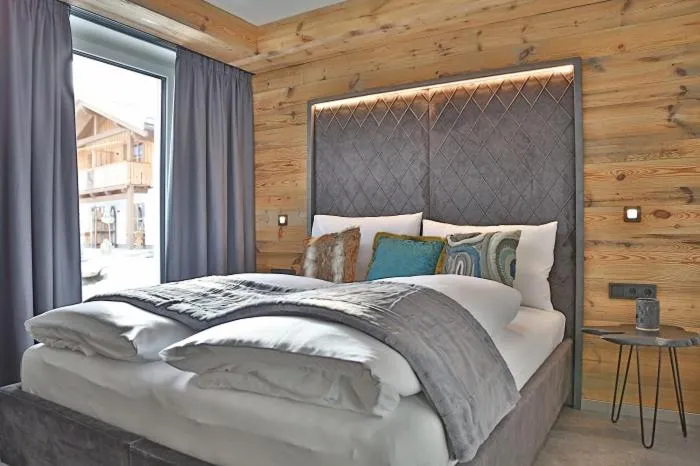 Bed in Sieglhub Chalets - Appartements - Hotel