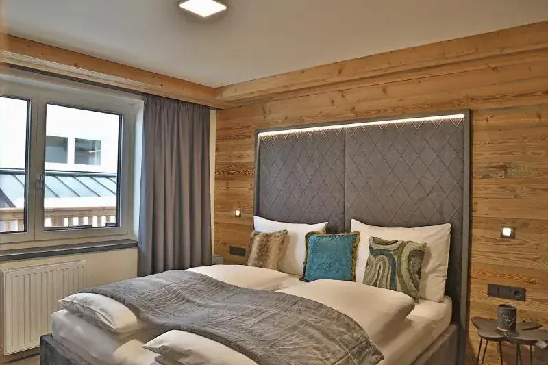 Quadruple Room in Sieglhub Chalets - Appartements - Hotel Quadruple Room in Sieglhub Chalets - Appartements - Hotel