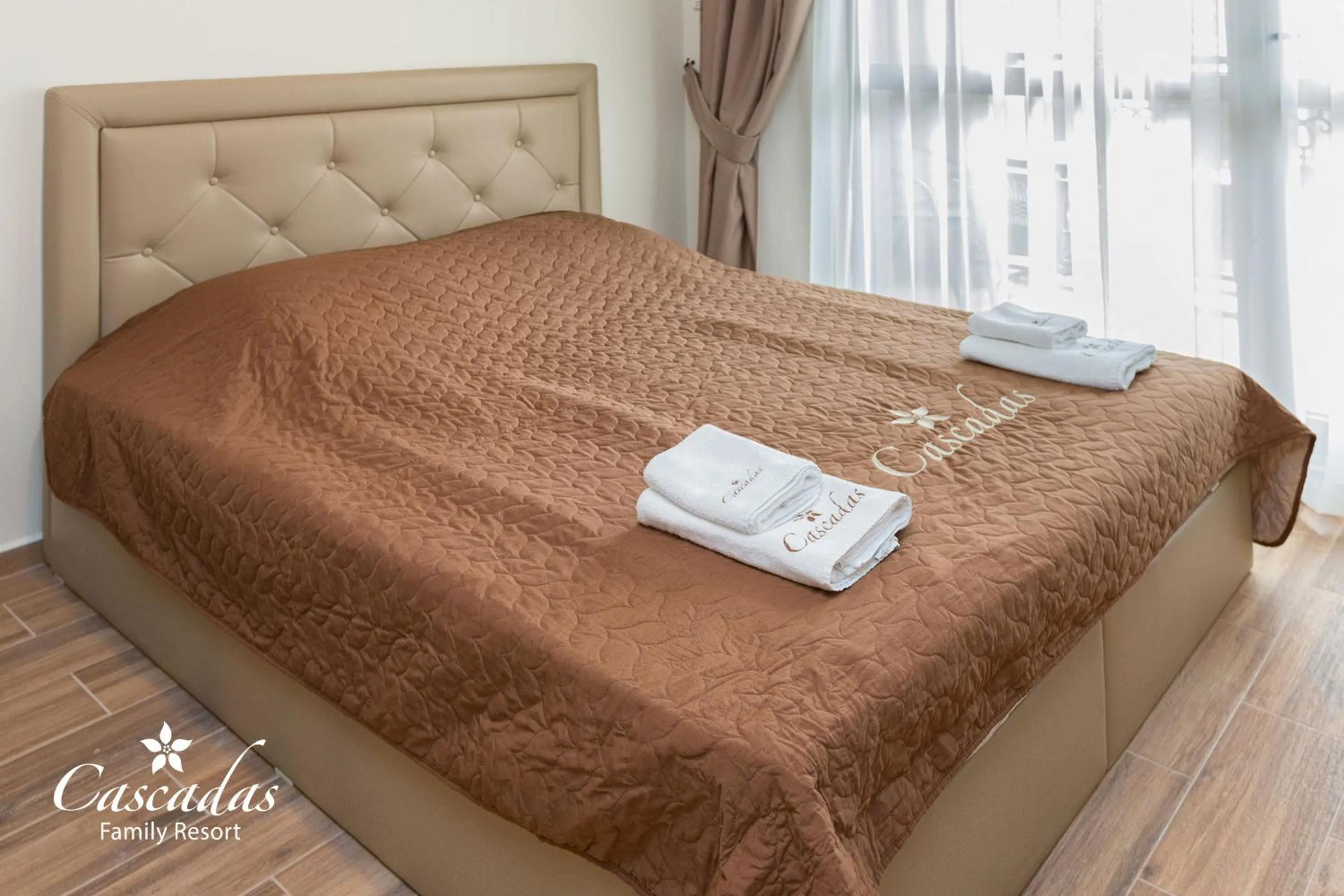 Bed in Cascadas Family Resort