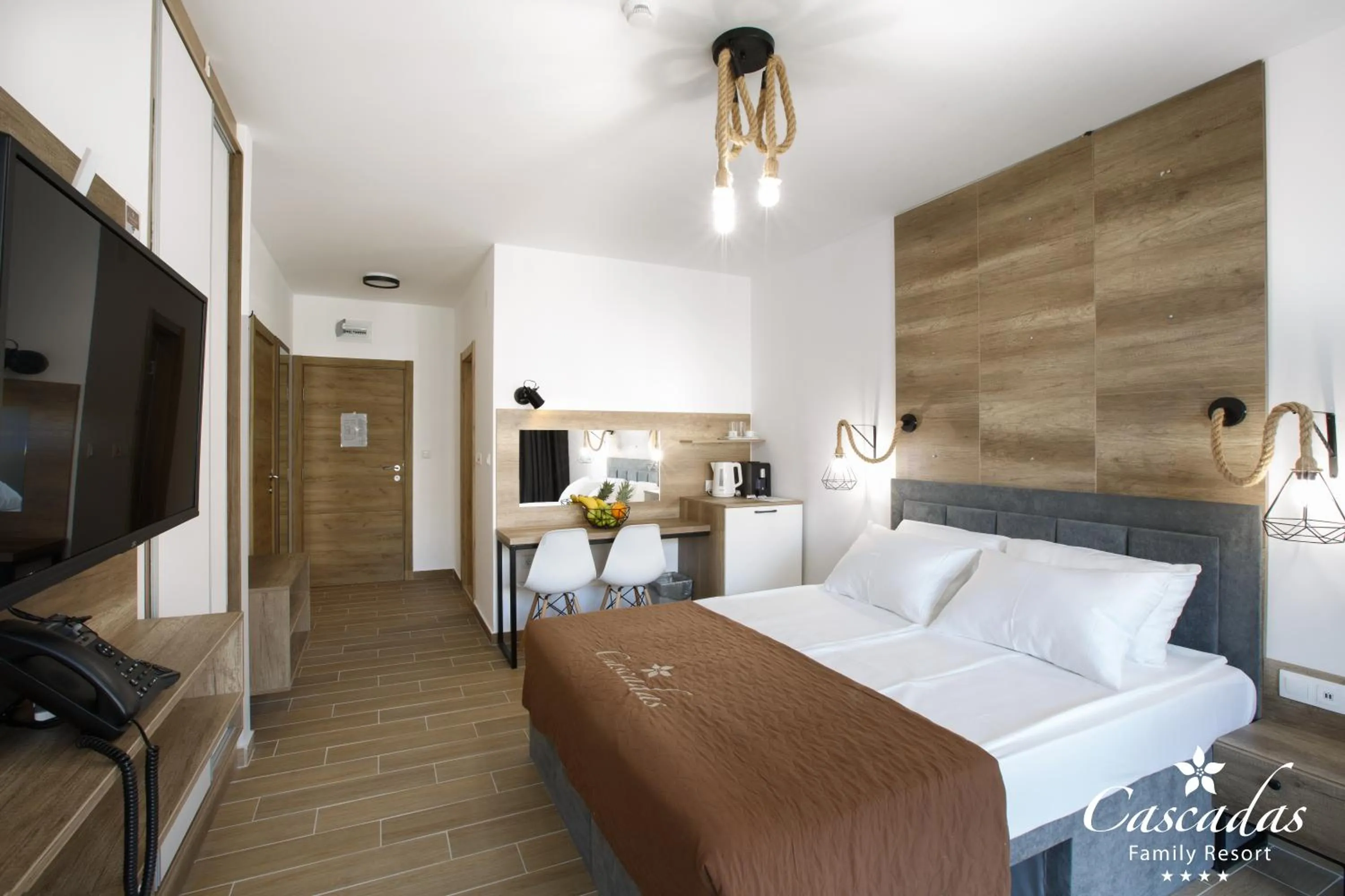 Bed in Cascadas Family Resort