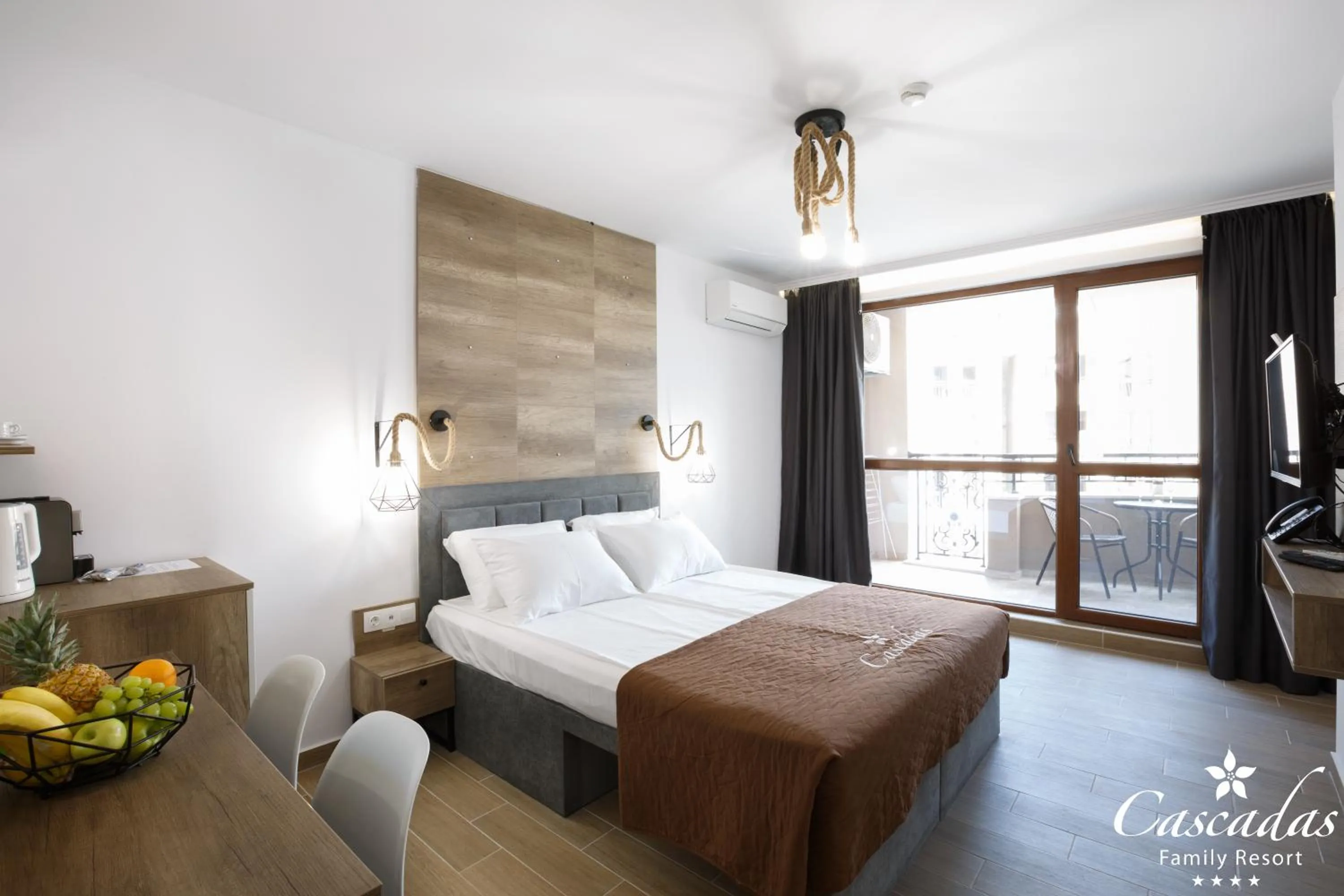 Bed in Cascadas Family Resort