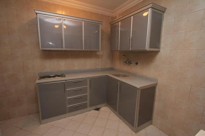 Kitchen or kitchenette in Raoum Inn Majmaa