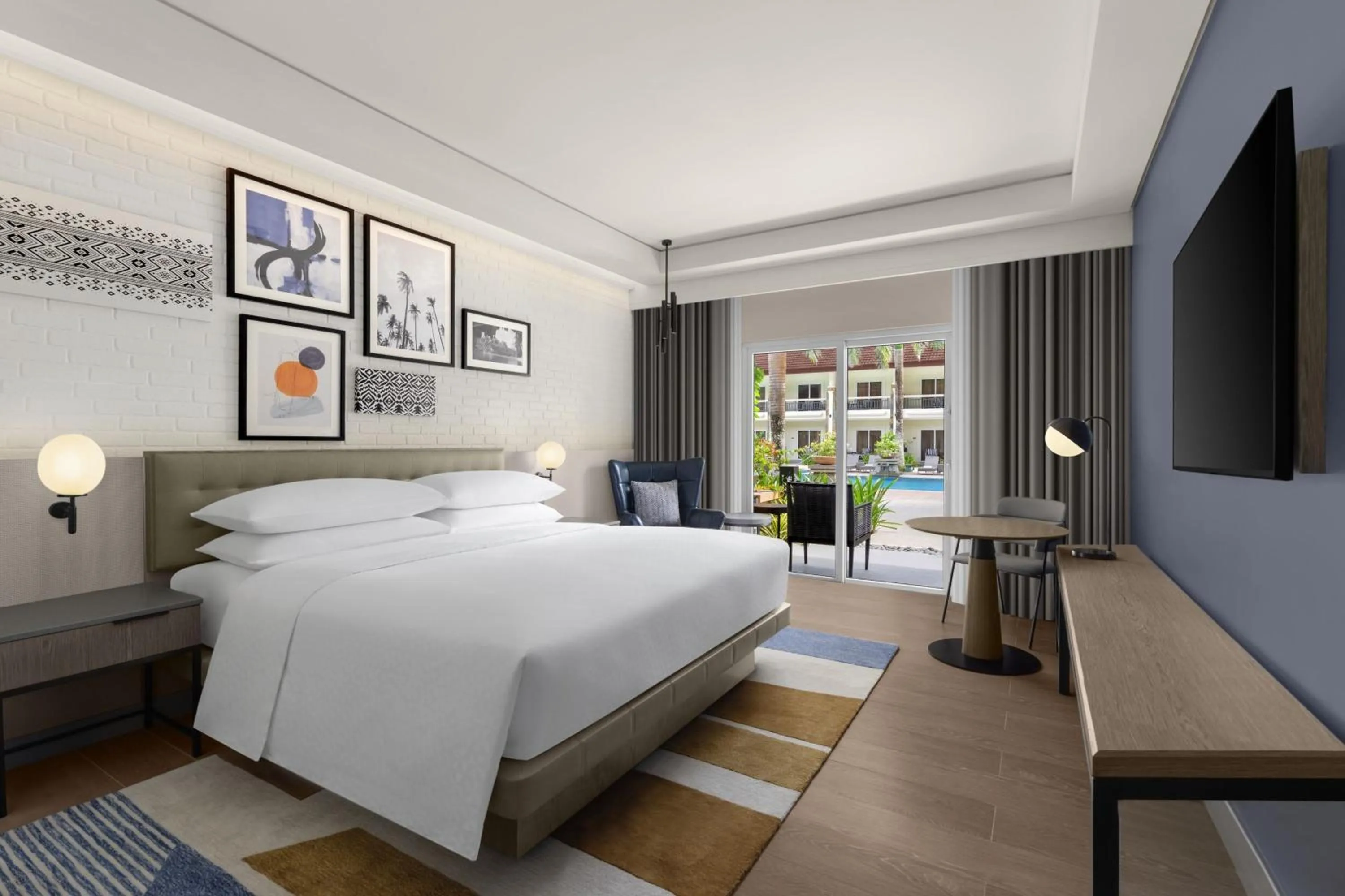 Swimming pool, Bed in Four Points by Sheraton Palawan Puerto Princesa