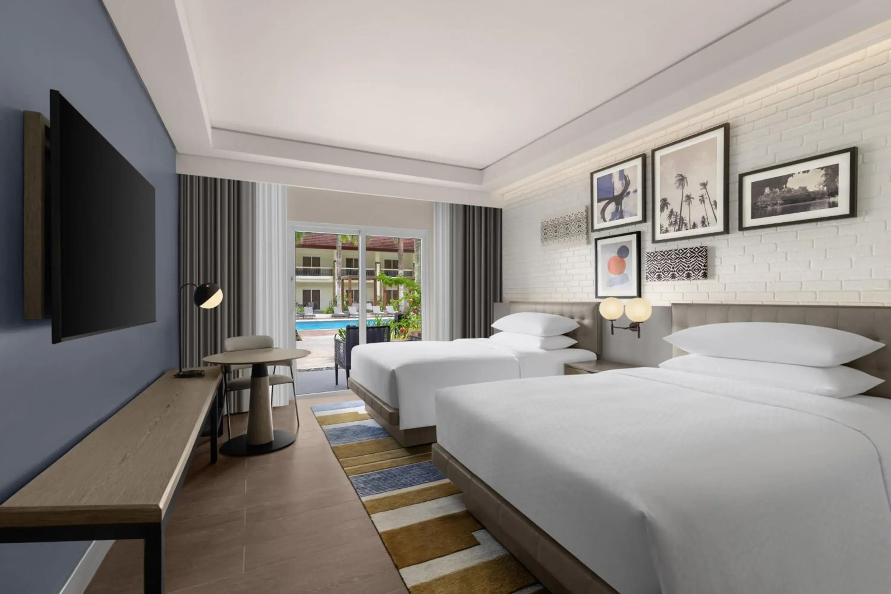 Deluxe Double Room with Balcony and Pool View in Four Points by Sheraton Palawan Puerto Princesa Deluxe Double Room with Balcony and Pool View in Four Points by Sheraton Palawan Puerto Princesa