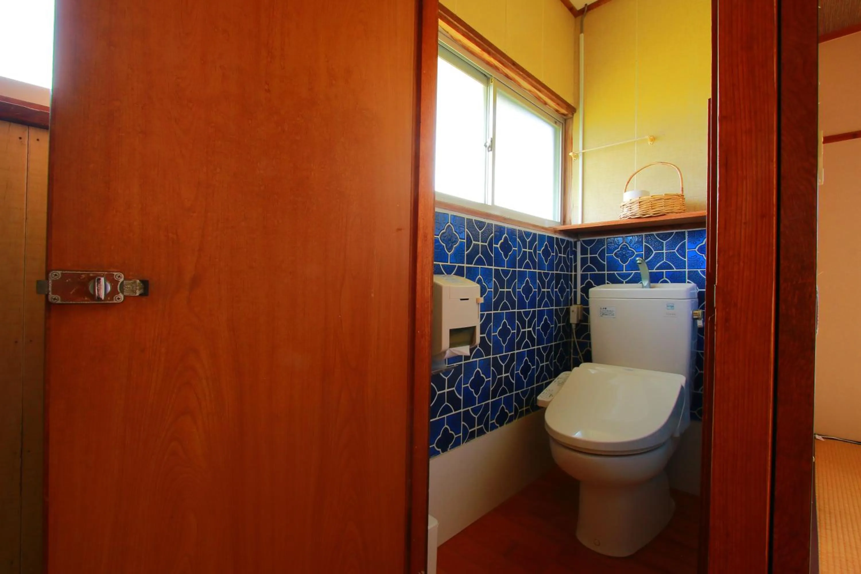 Toilet in Family Ryokan Kawakyu with Showa Retro, private hot spring