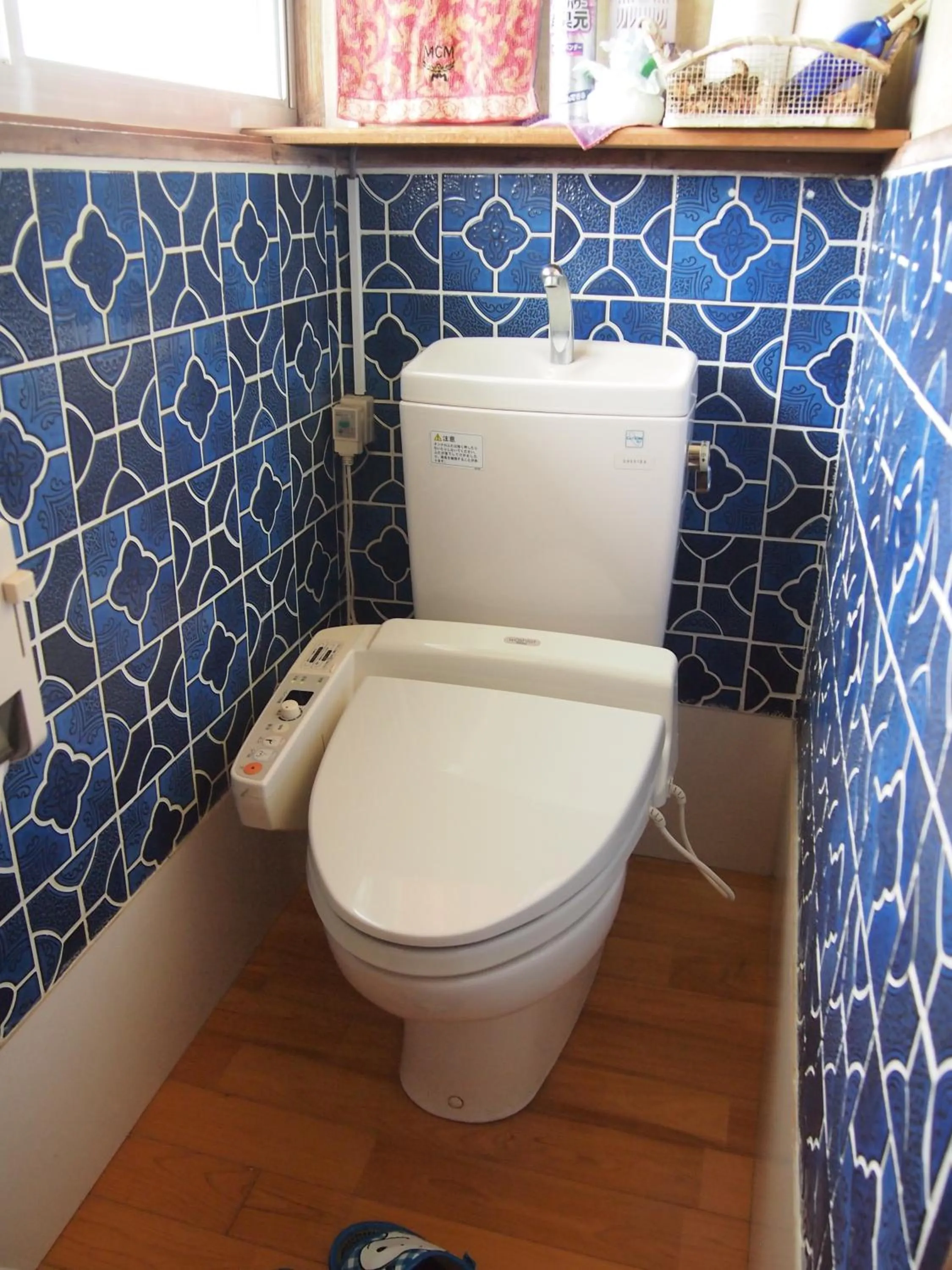 Toilet in Family Ryokan Kawakyu with Showa Retro, private hot spring