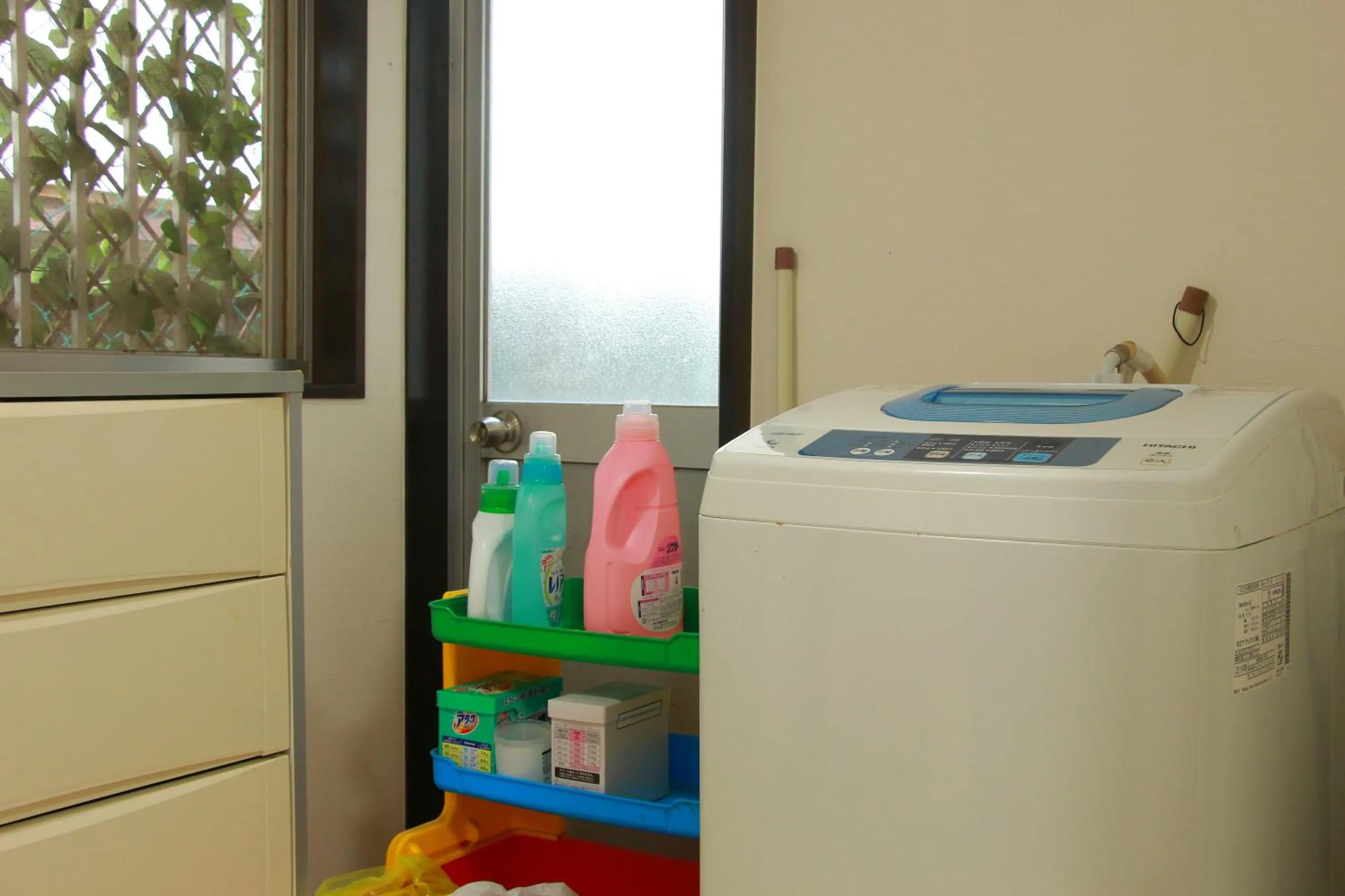 washing machine in Family Ryokan Kawakyu with Showa Retro, private hot spring