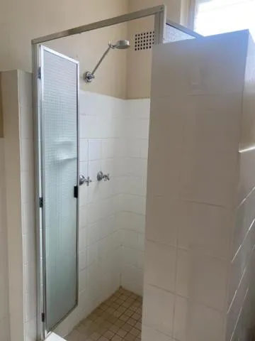 Shower in Ultimate Apartments Bondi Beach