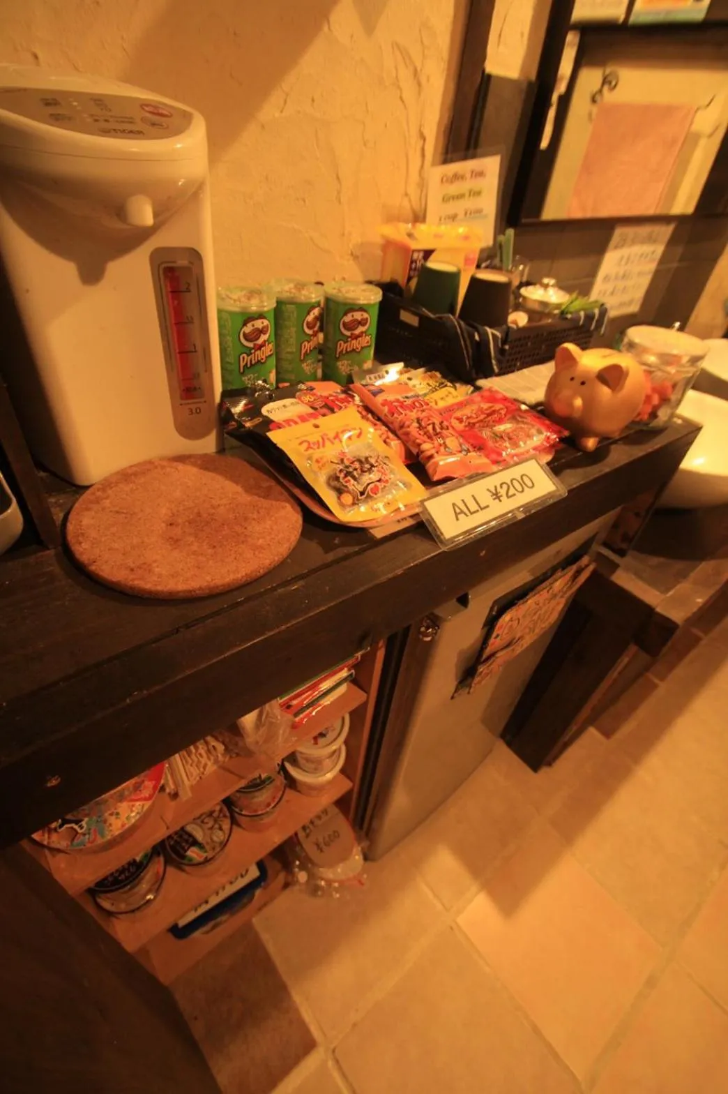 Communal lounge/ TV room in Taketomijima Guesthouse and je Taime