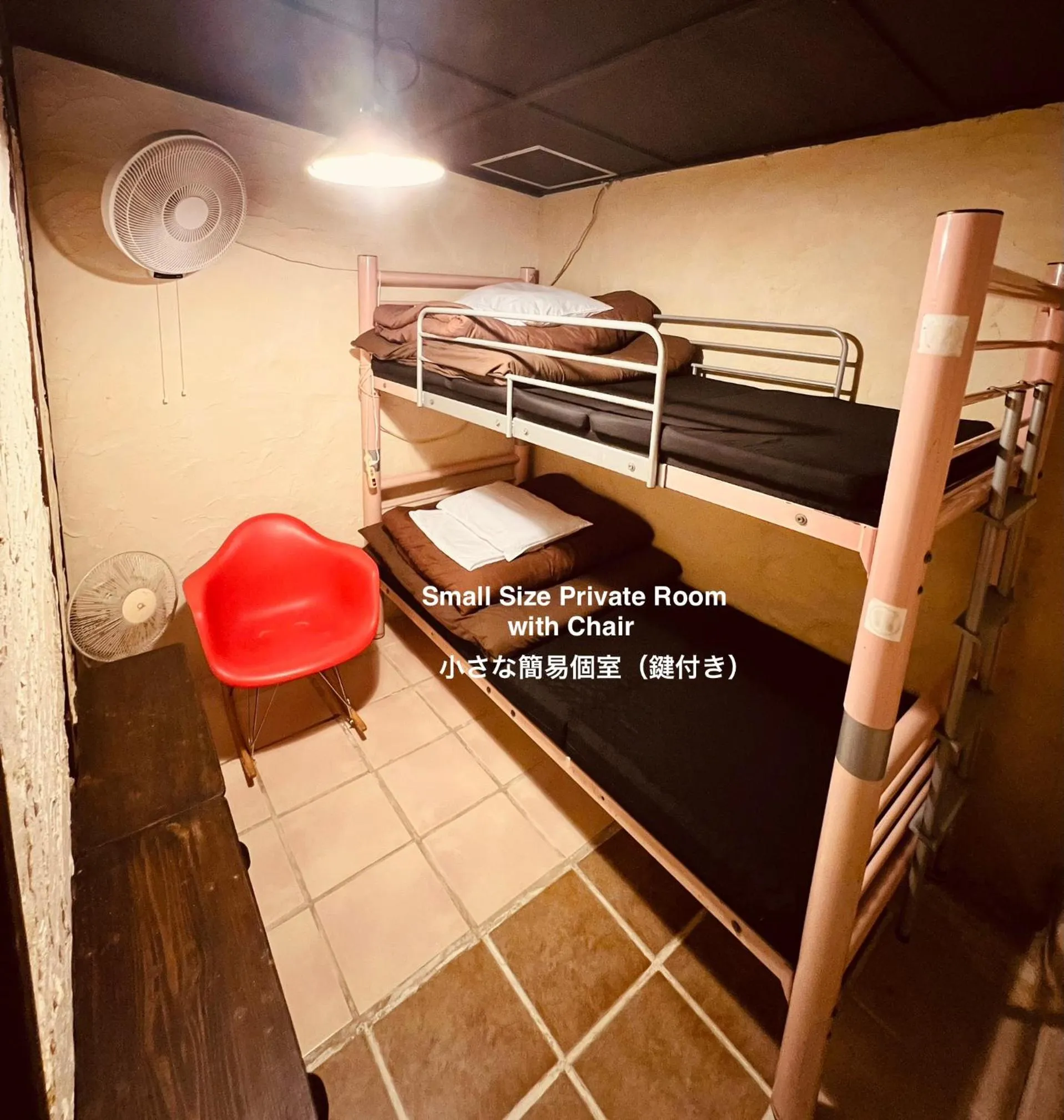 Bed in Taketomijima Guesthouse and je Taime