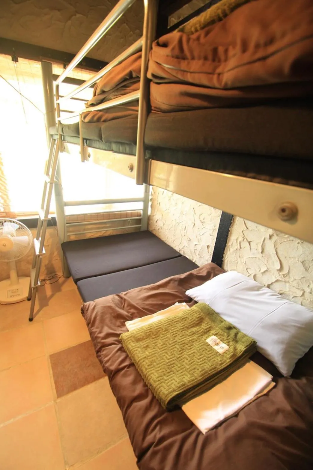 bunk bed, Bed in Taketomijima Guesthouse and je Taime