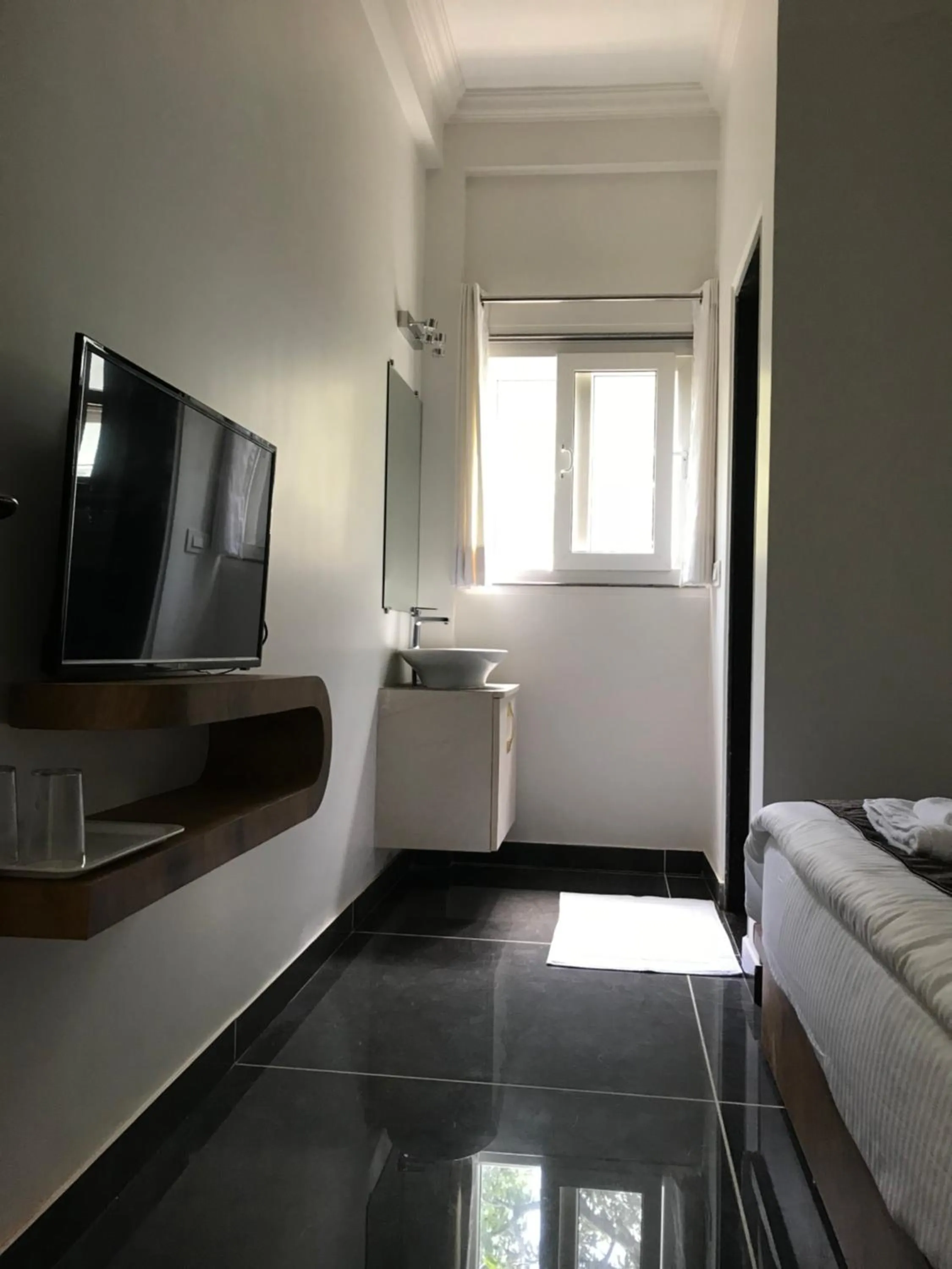 Living room, Bed in Rankk Stays