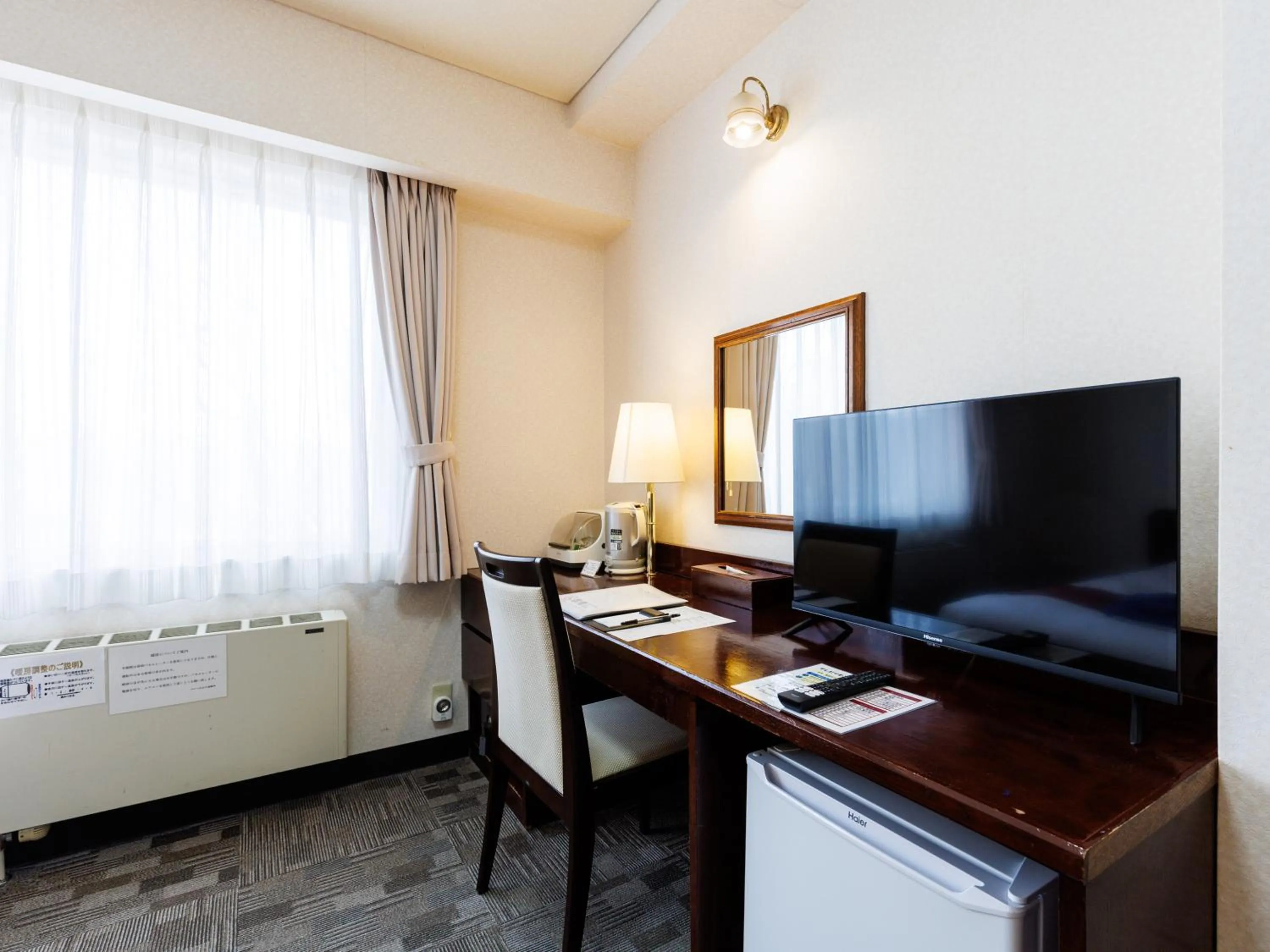 Bed in Tabist Hotel Nemuro Kaiyoutei