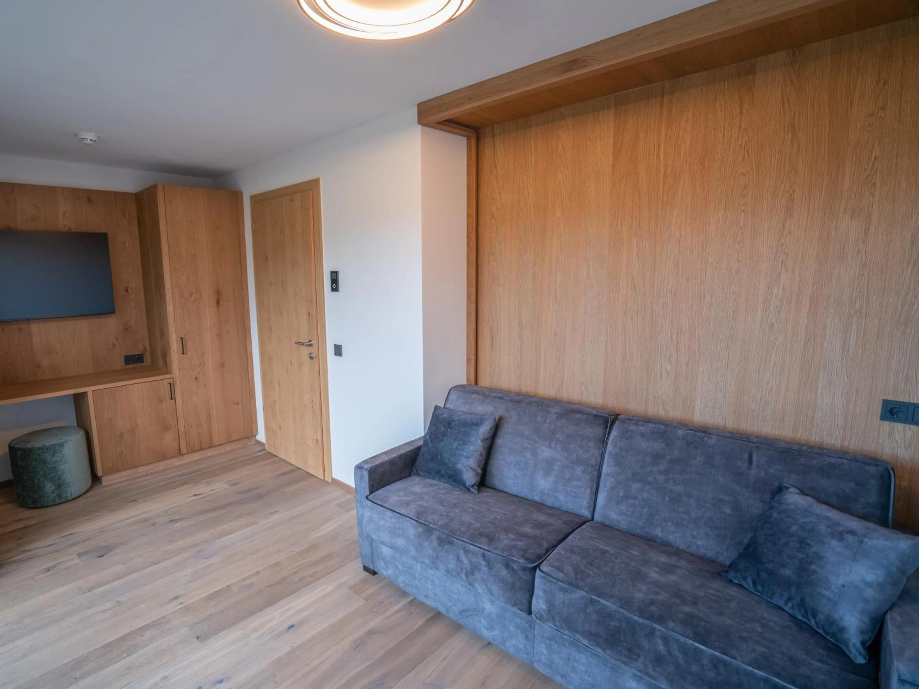 Living room in Hotel Purvita by Oberlechner