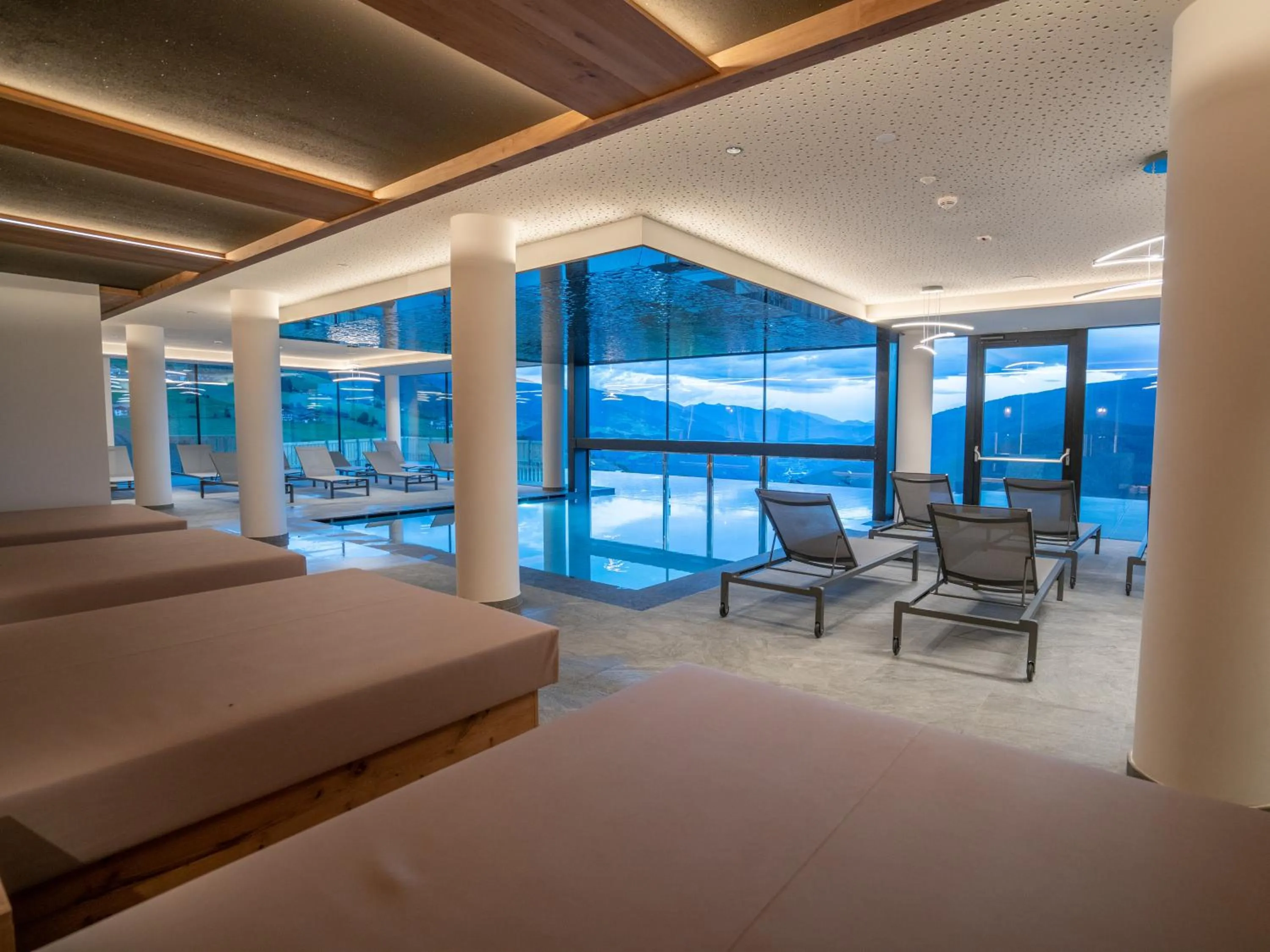 Swimming pool in Hotel Purvita by Oberlechner