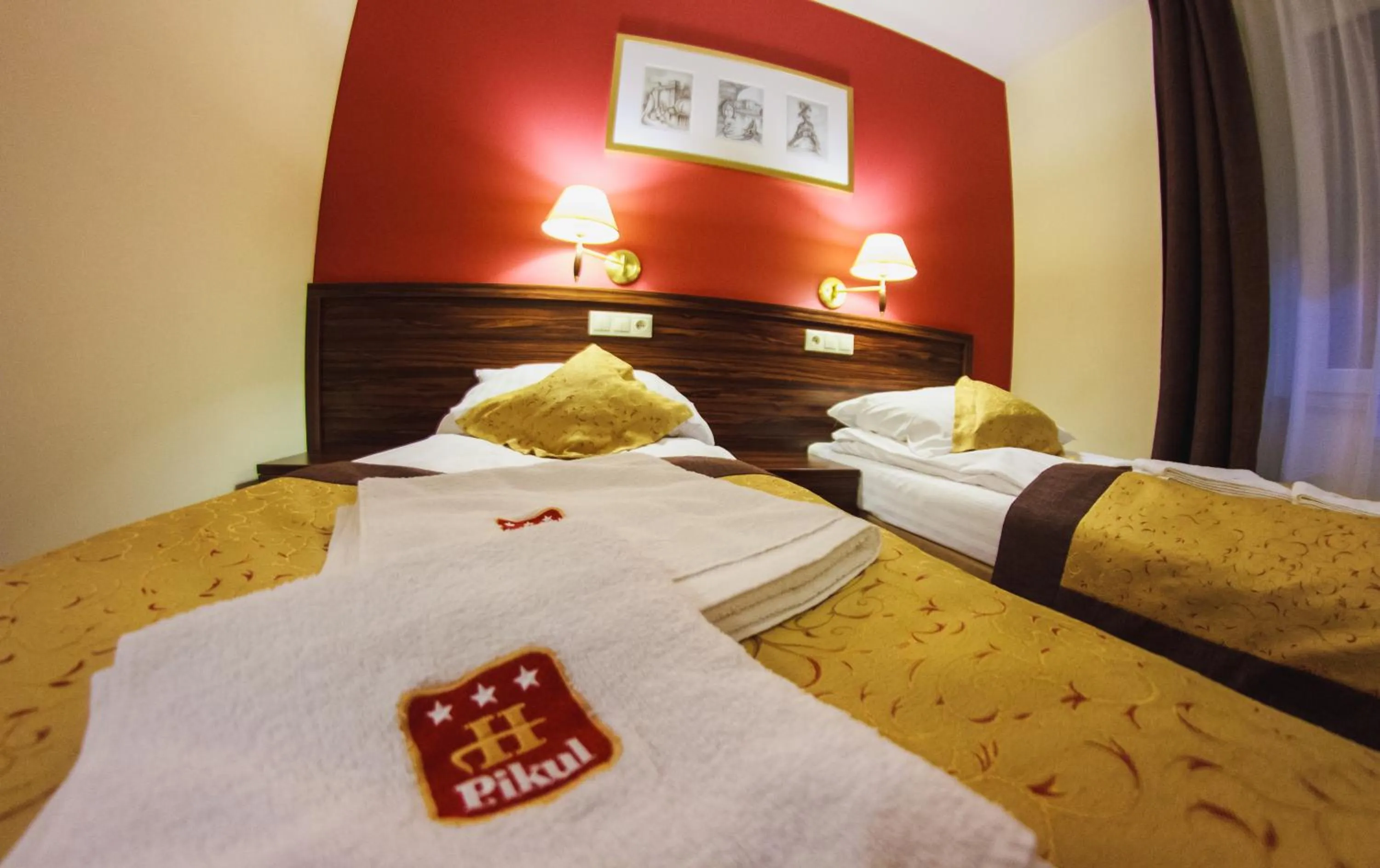 Property logo or sign, Bed in Hotel Pikul