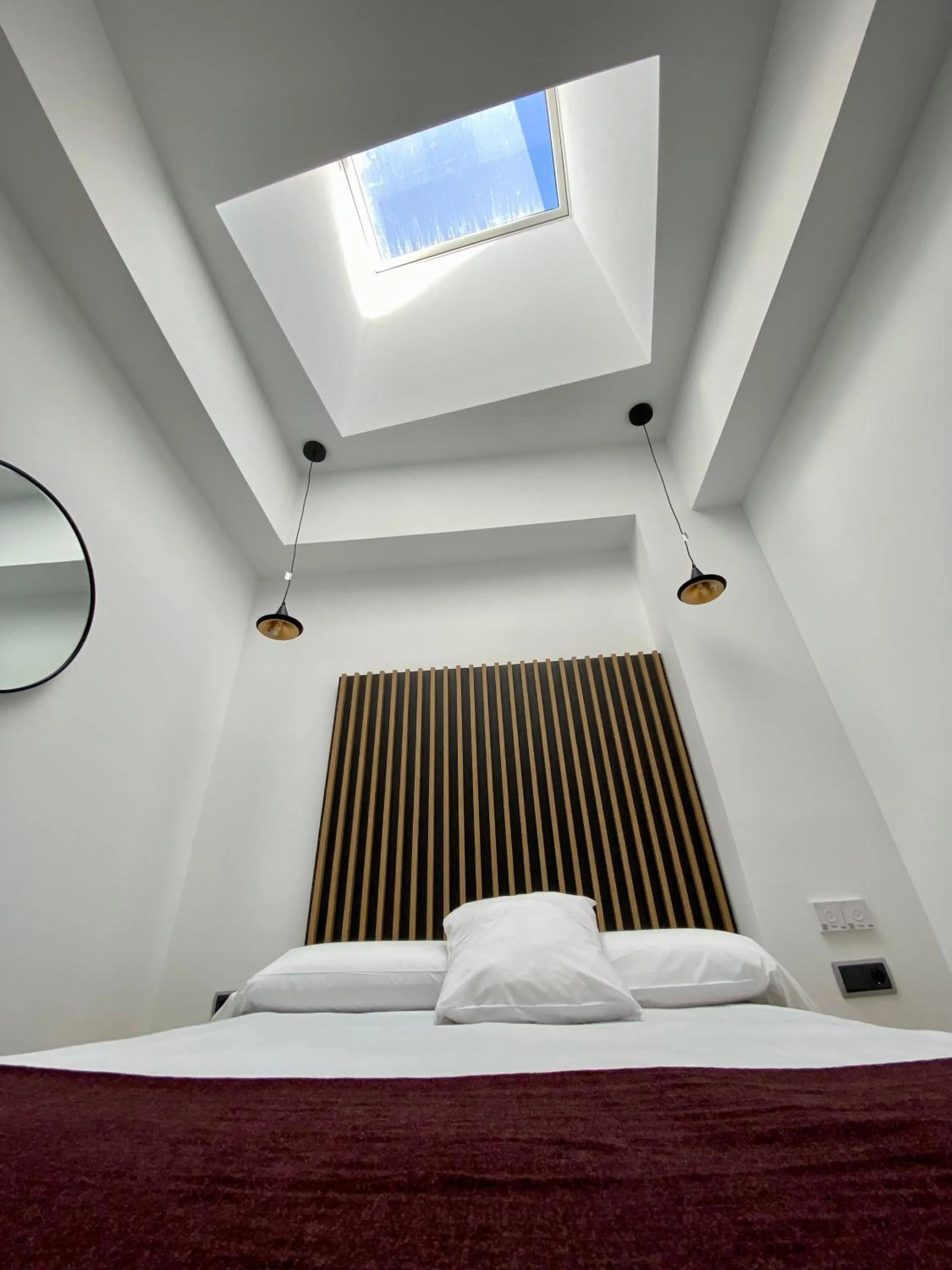 Bed in Evenia Alcalá Boutique Hotel