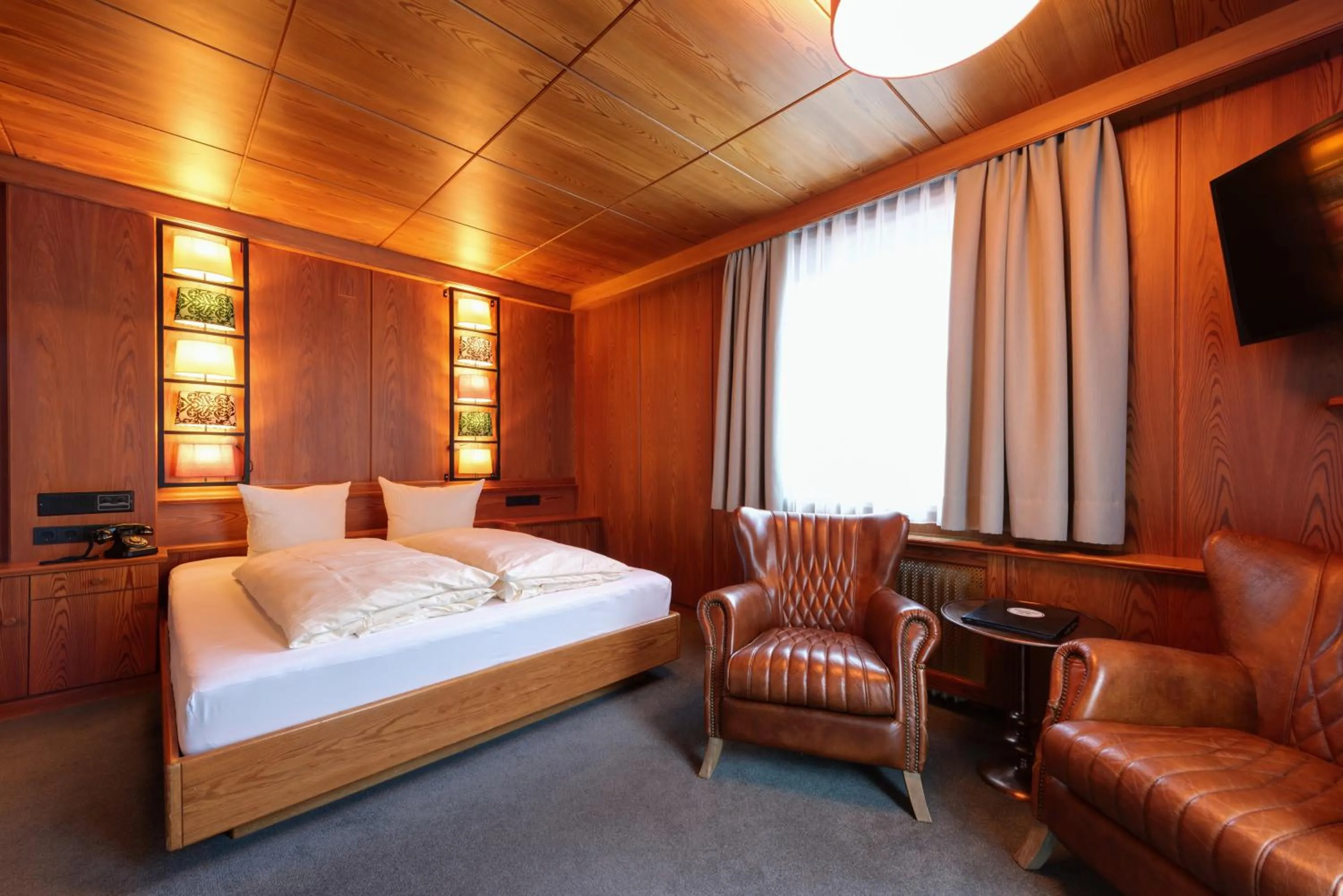 Photo of the whole room, Bed in Hotel Pension Kirchplatz