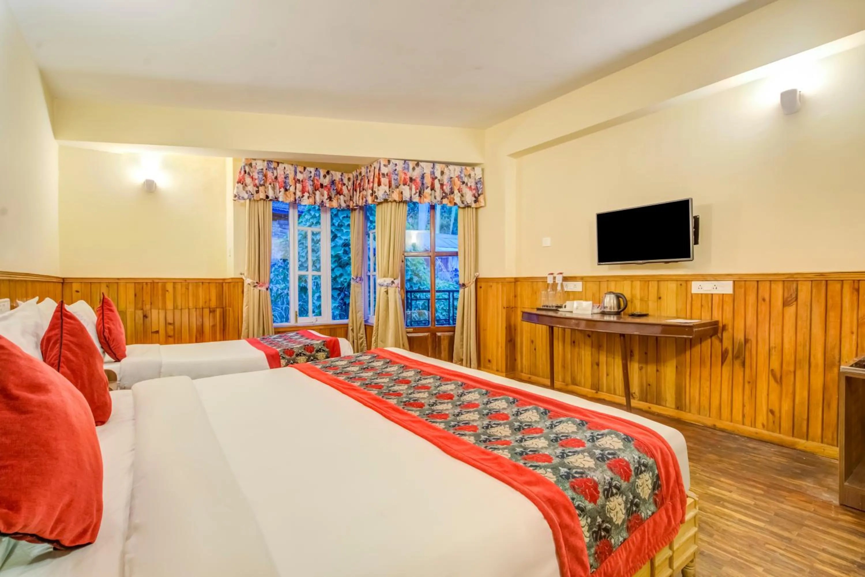 Bed in Summit Newa Regency