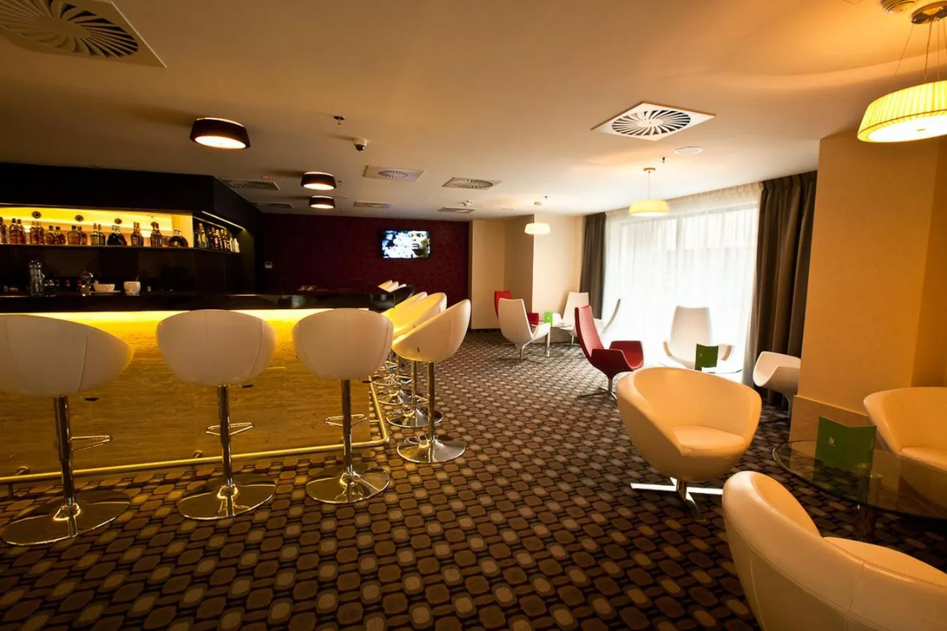 Lounge or bar in Holiday Inn Łódź by IHG
