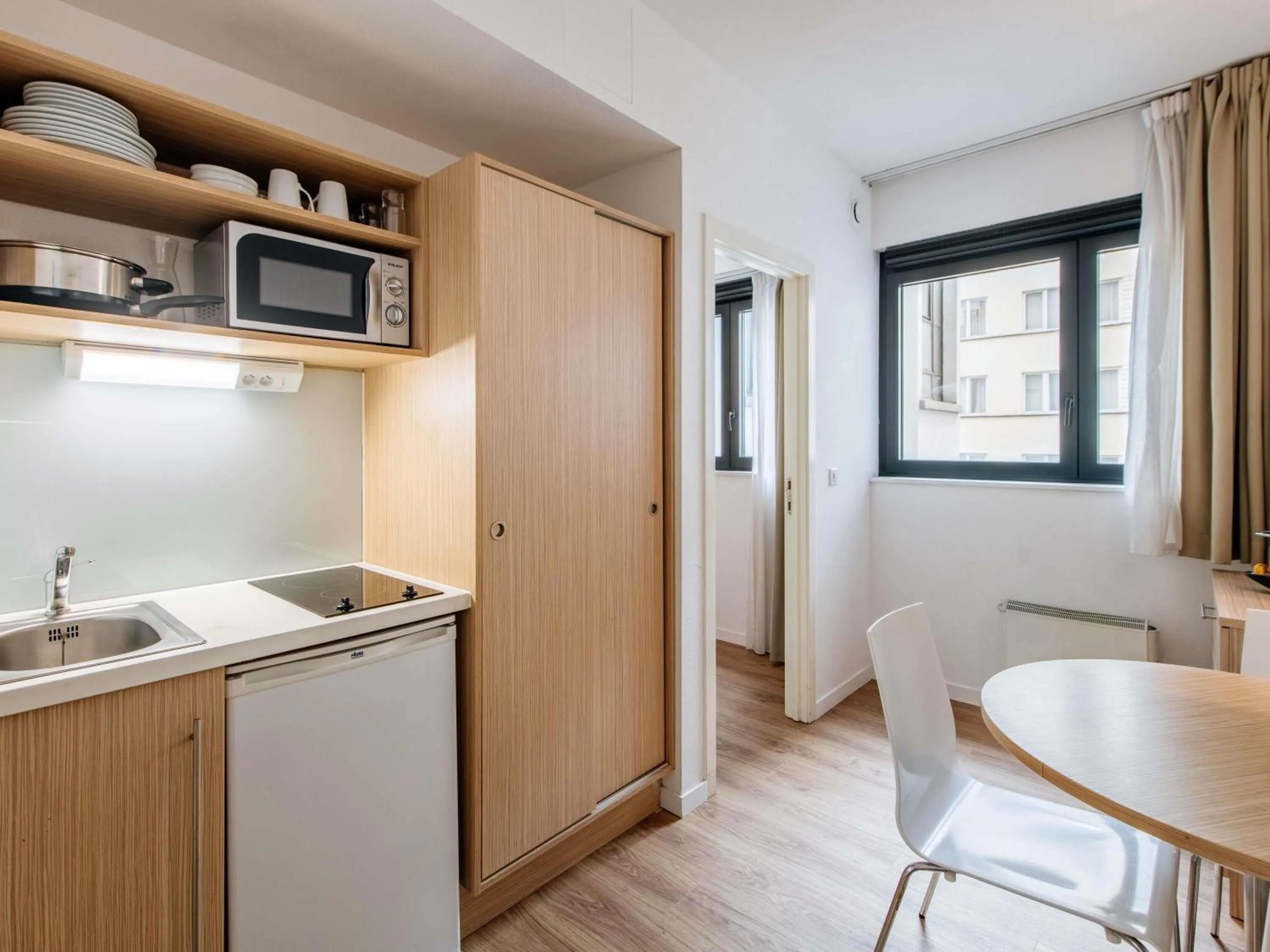 Bedroom in Aparthotel Adagio Access Bruxelles Europe Aparthotel