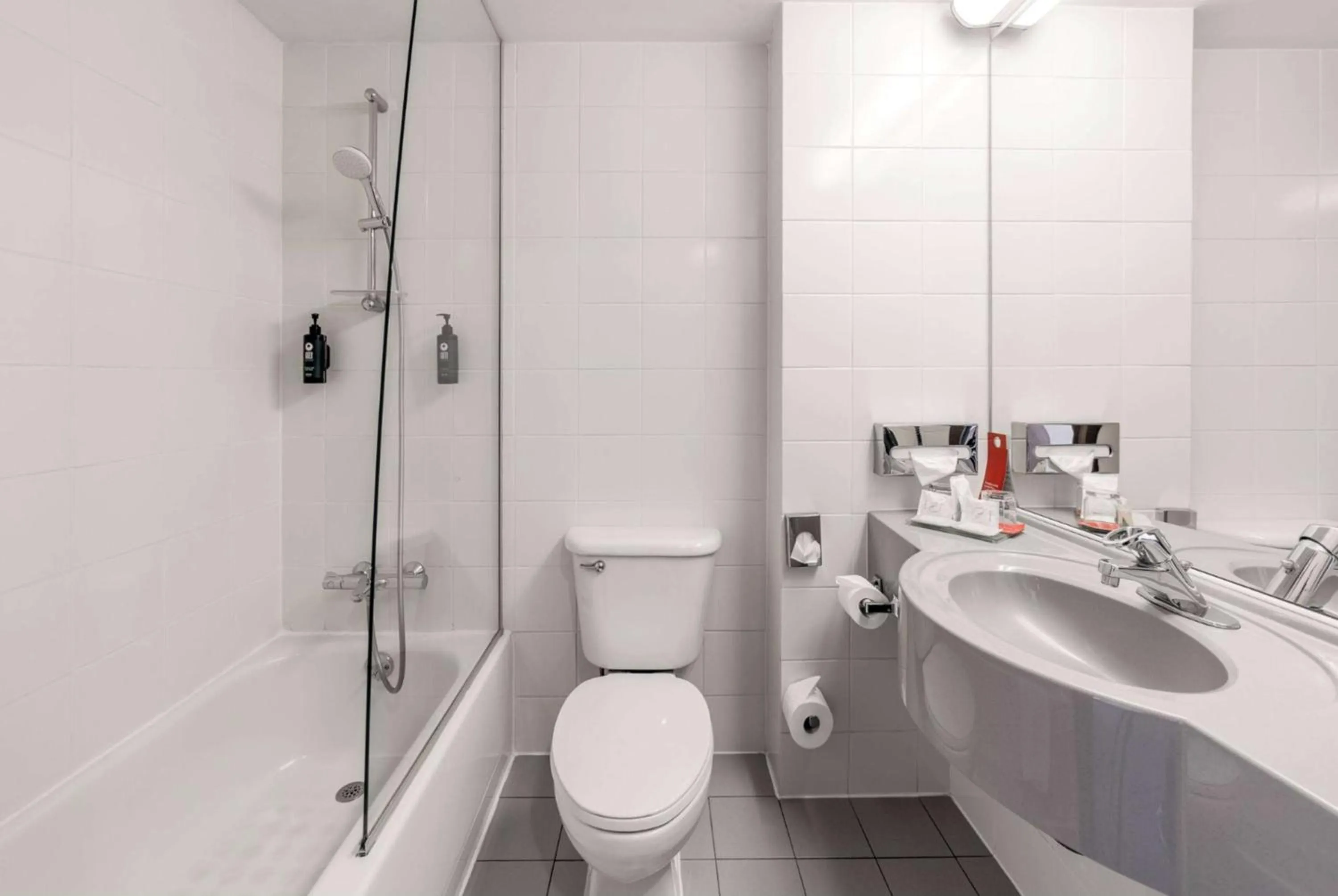 Toilet in Ramada by Wyndham Bucharest Parc Hotel