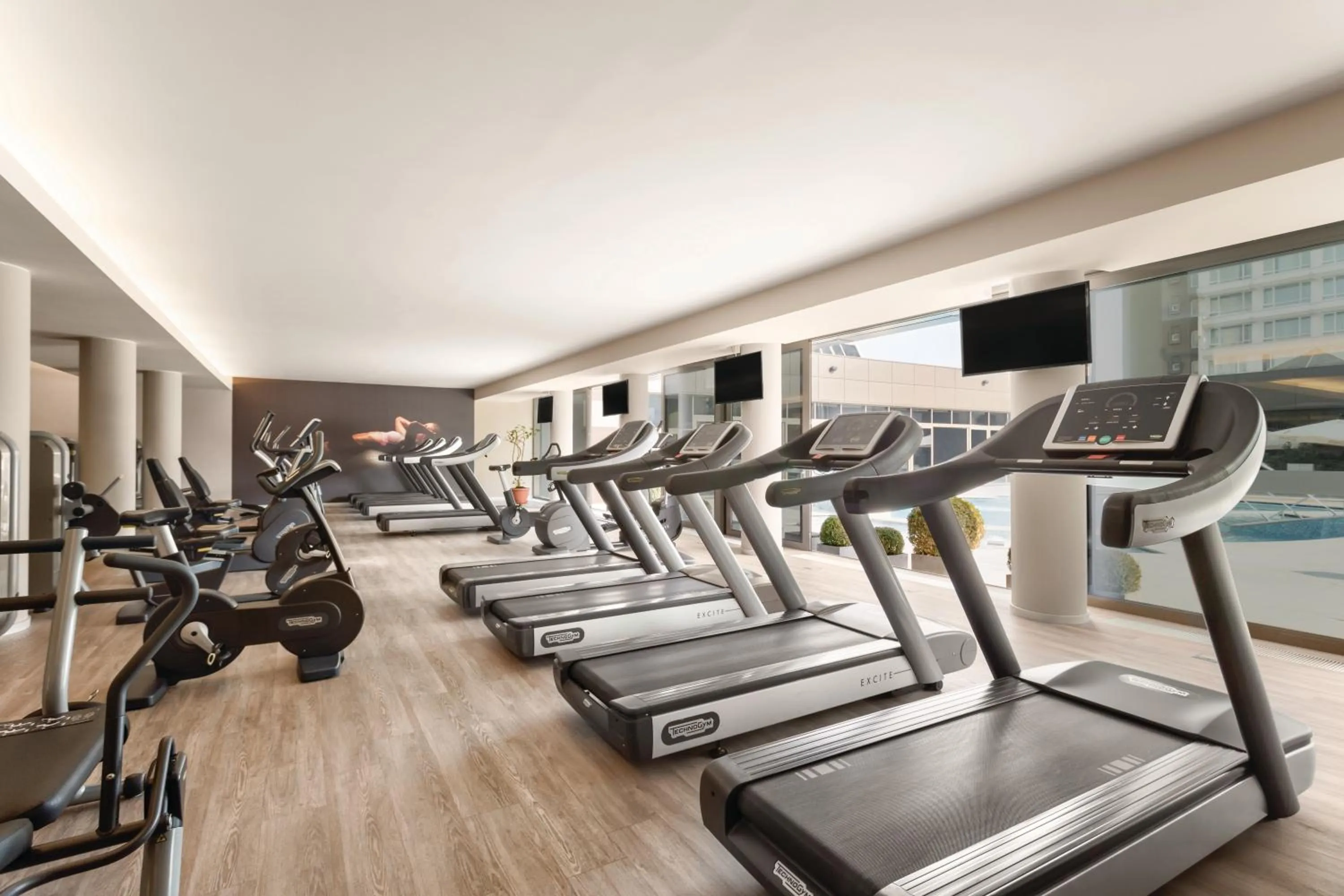 Fitness centre/facilities in Ramada by Wyndham Bucharest Parc Hotel