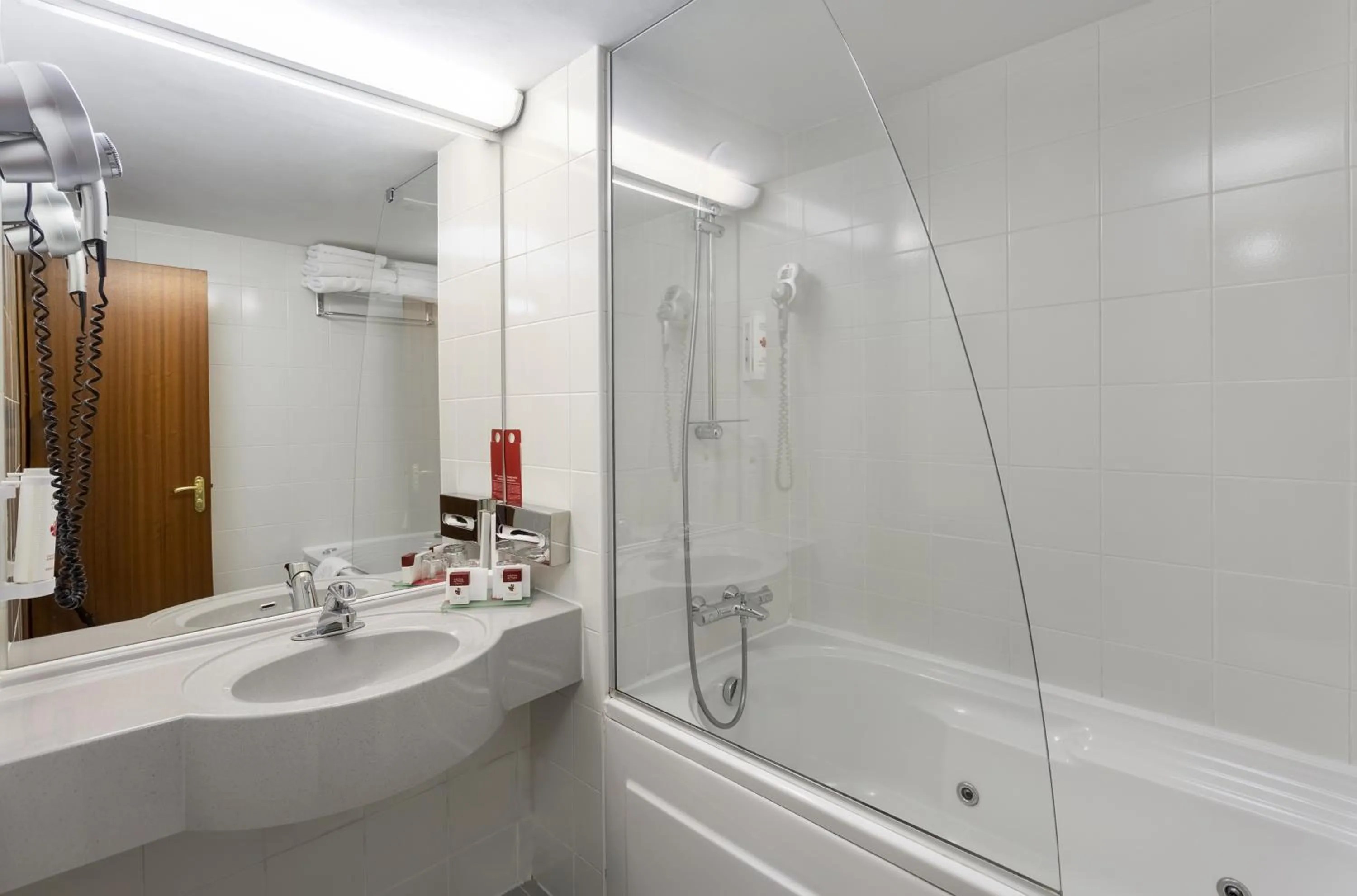 Bathroom in Ramada by Wyndham Bucharest Parc Hotel