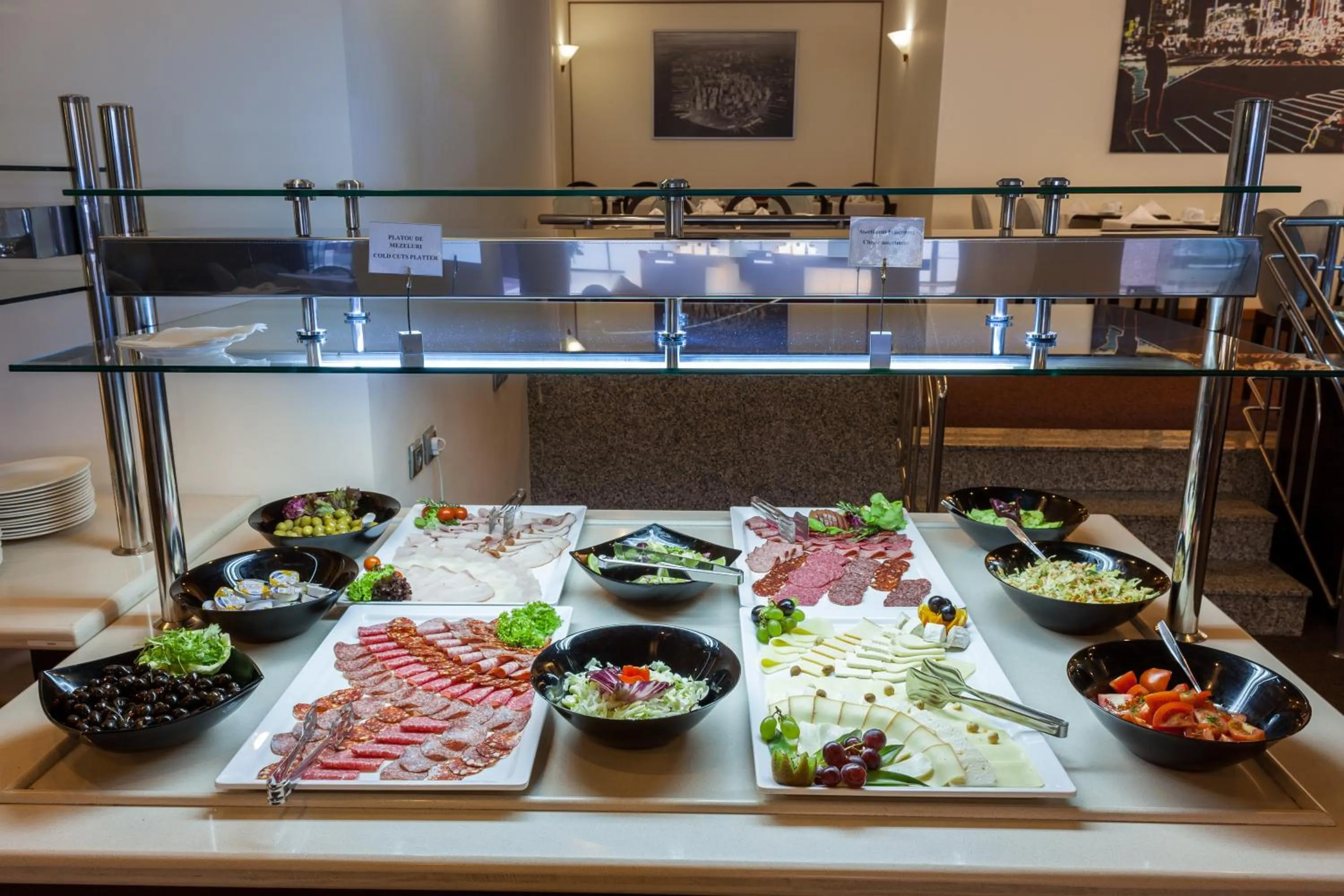 Buffet breakfast in Ramada by Wyndham Bucharest Parc Hotel