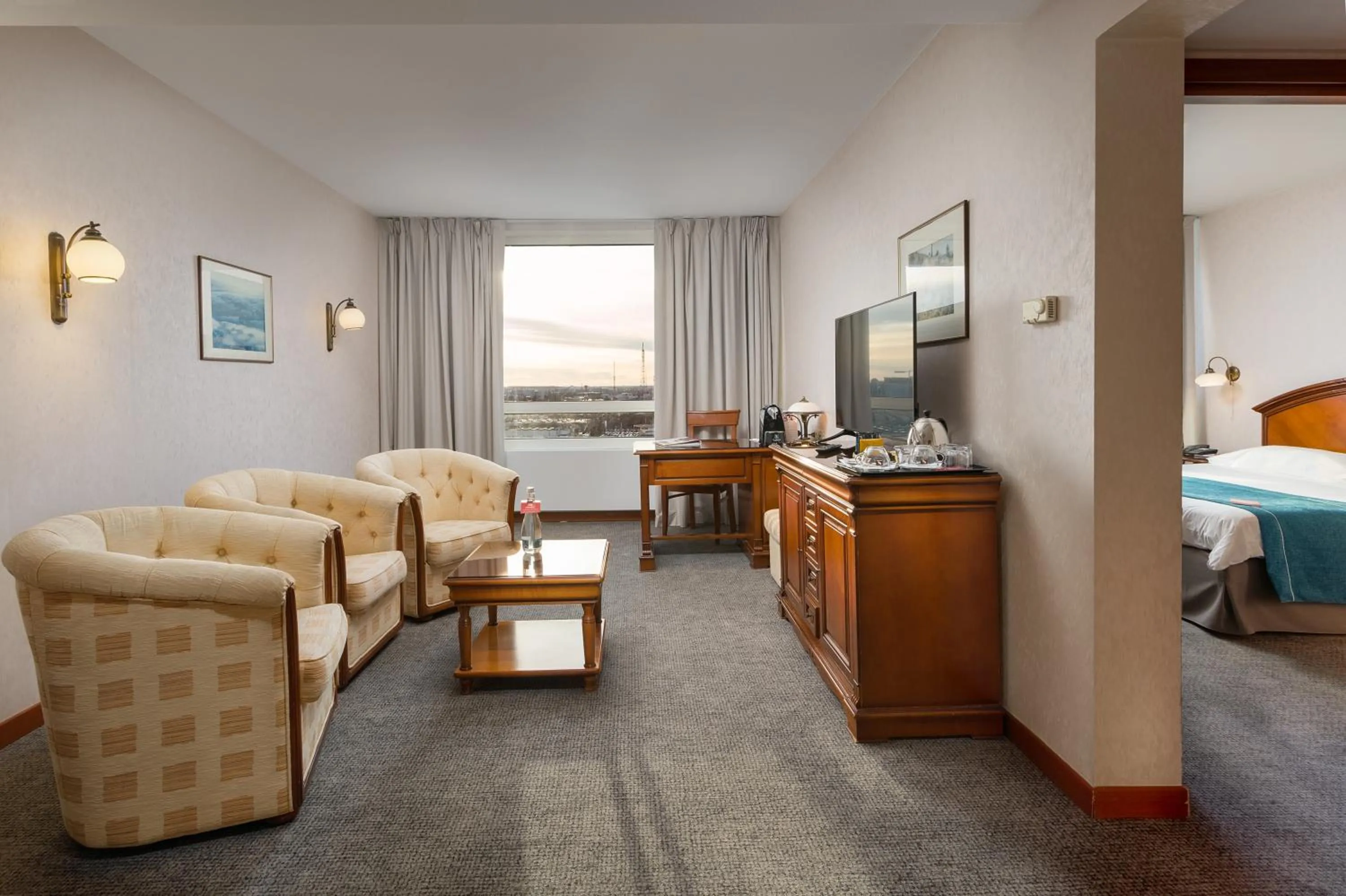 Living room in Ramada by Wyndham Bucharest Parc Hotel