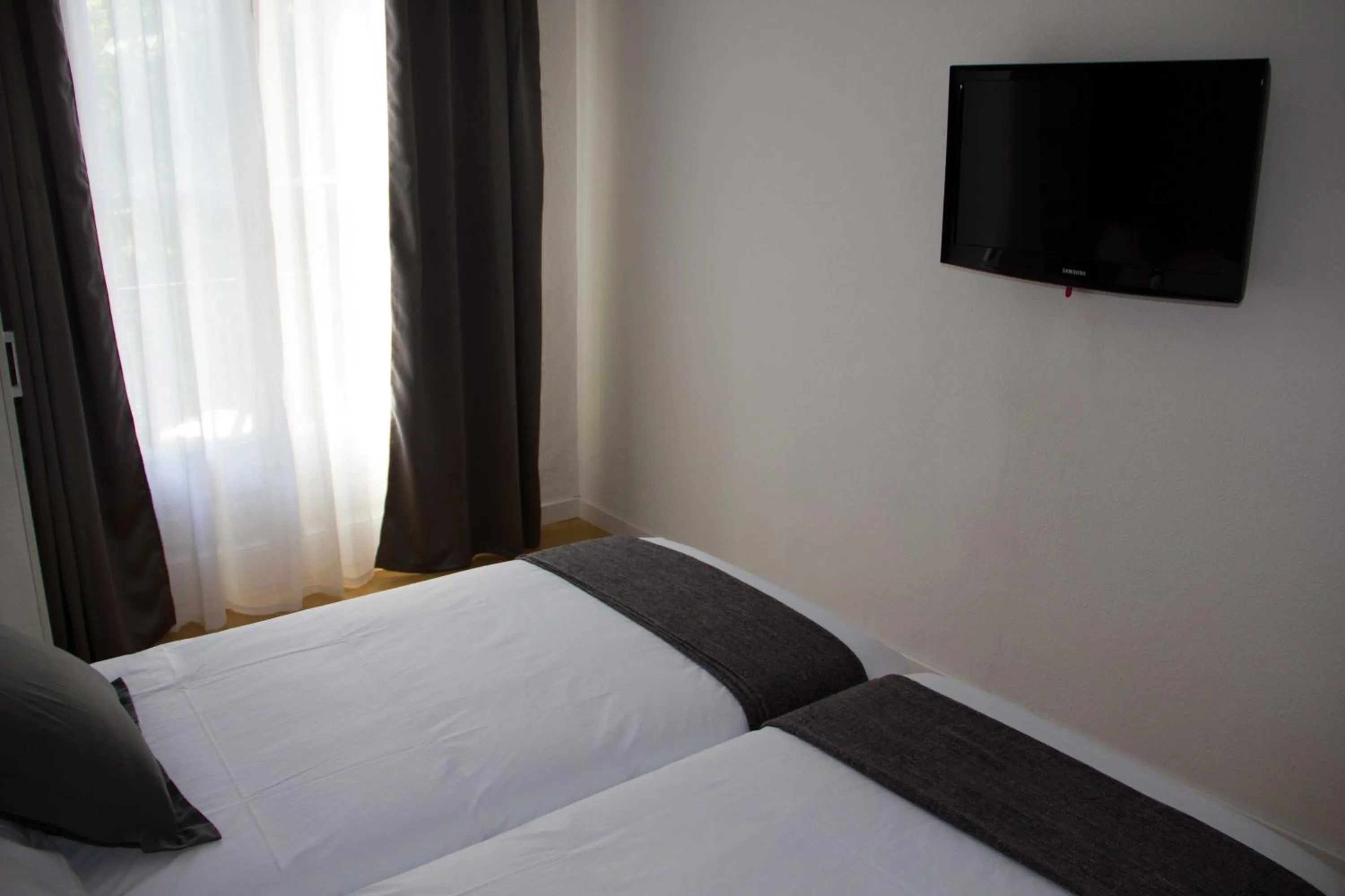 Bed in Hostalin Barcelona Diputacion