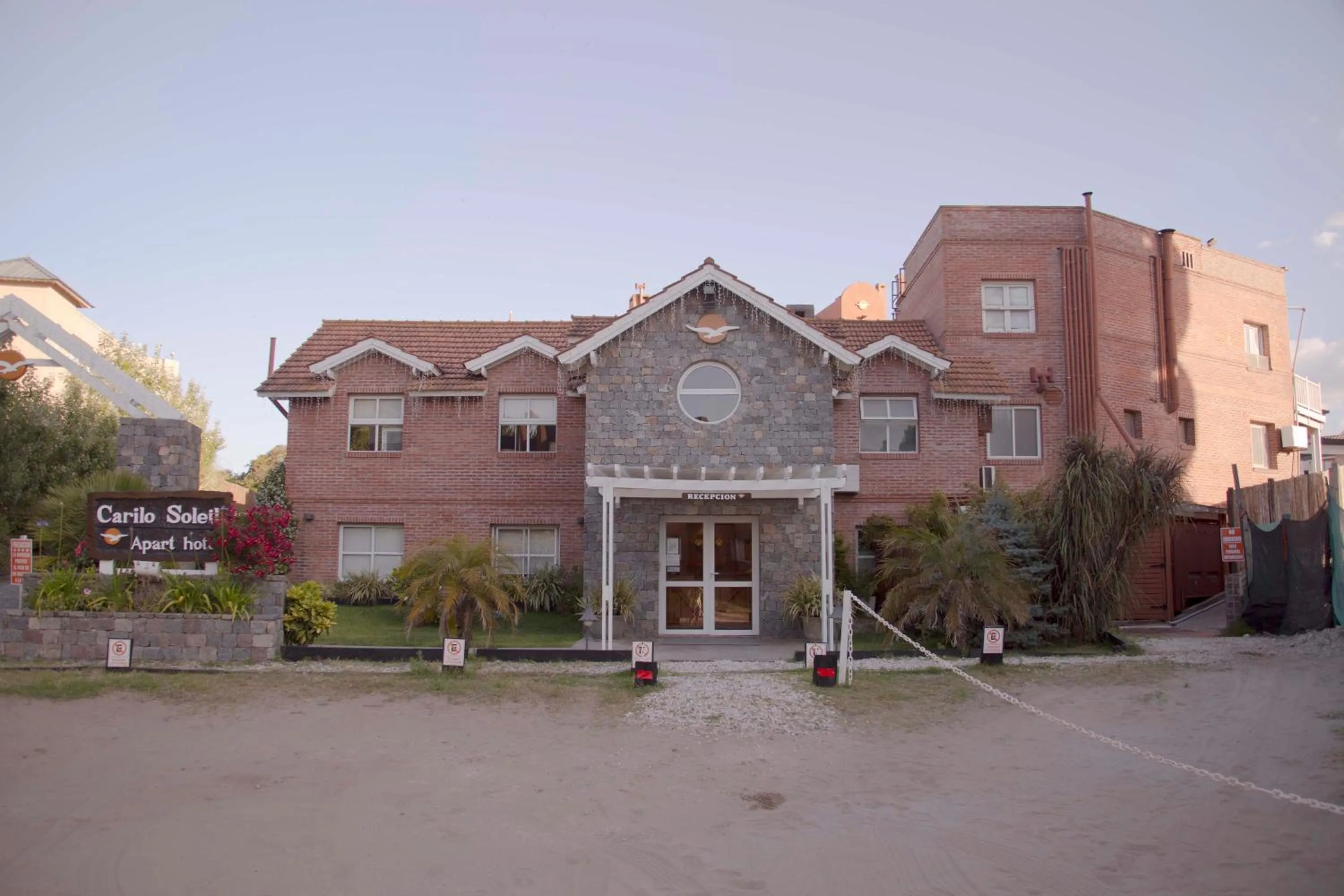 Facade/entrance in Carilo Soleil By HS