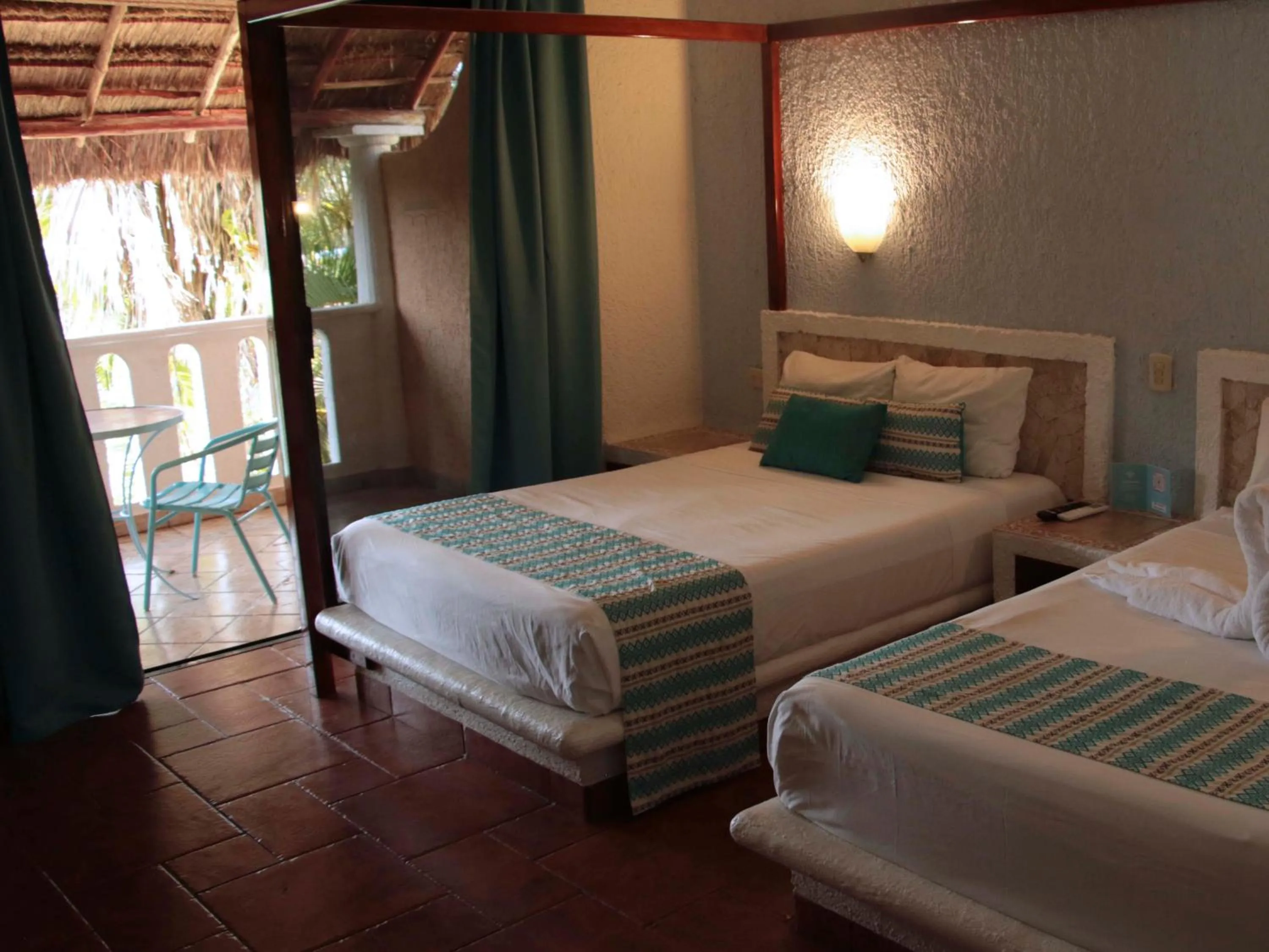 Balcony/Terrace, Bed in Chez Waffle Hotel