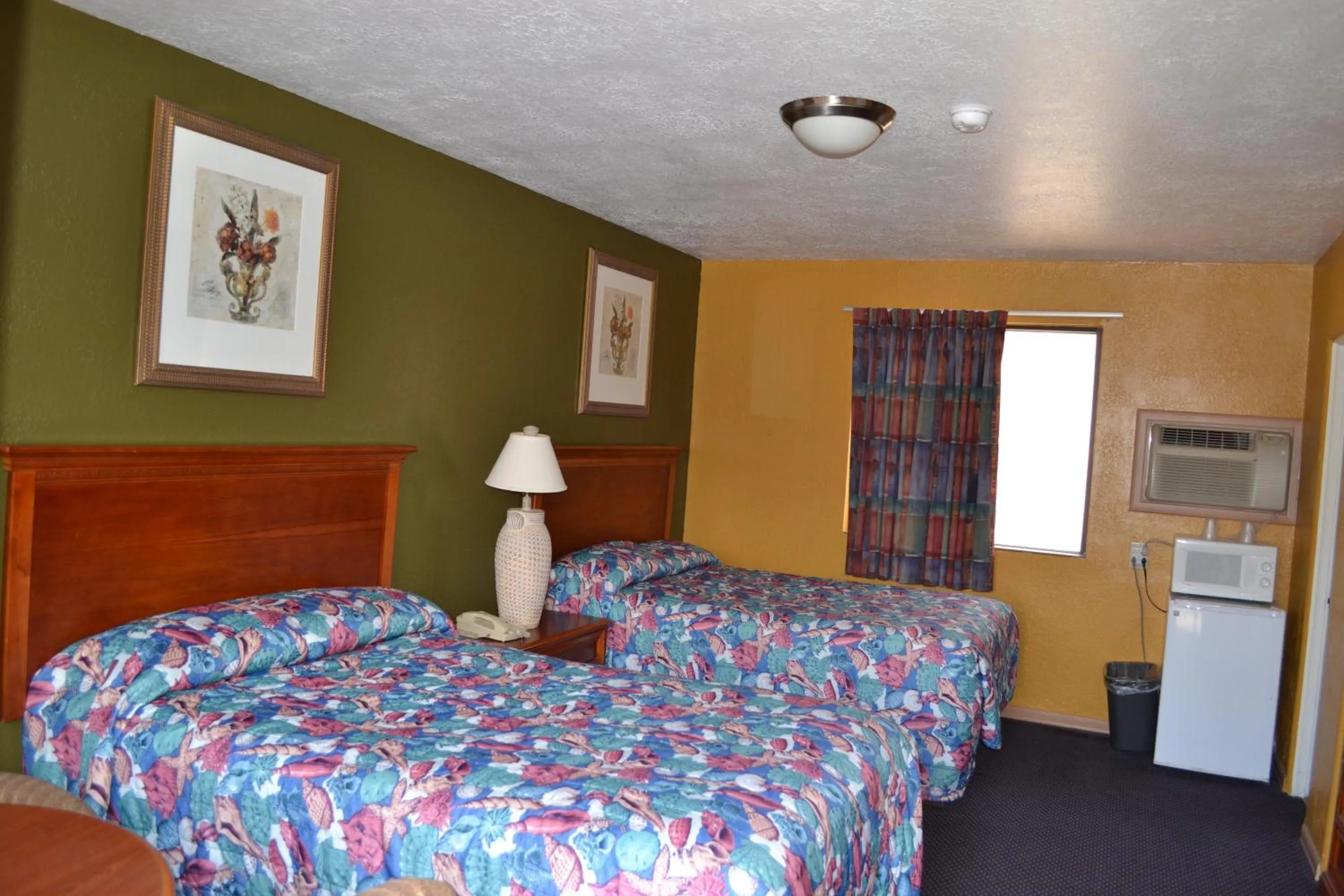 Bed in Atlantic Economy Inn