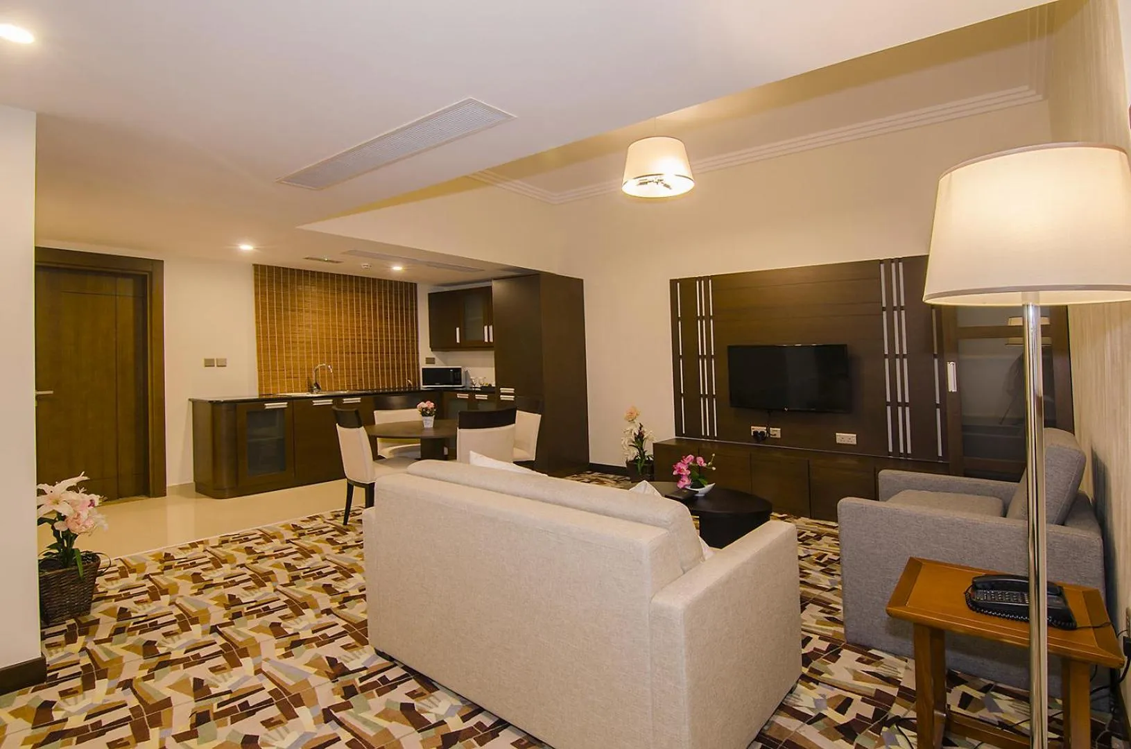 Communal lounge/ TV room in Al Murooj Grand Hotel