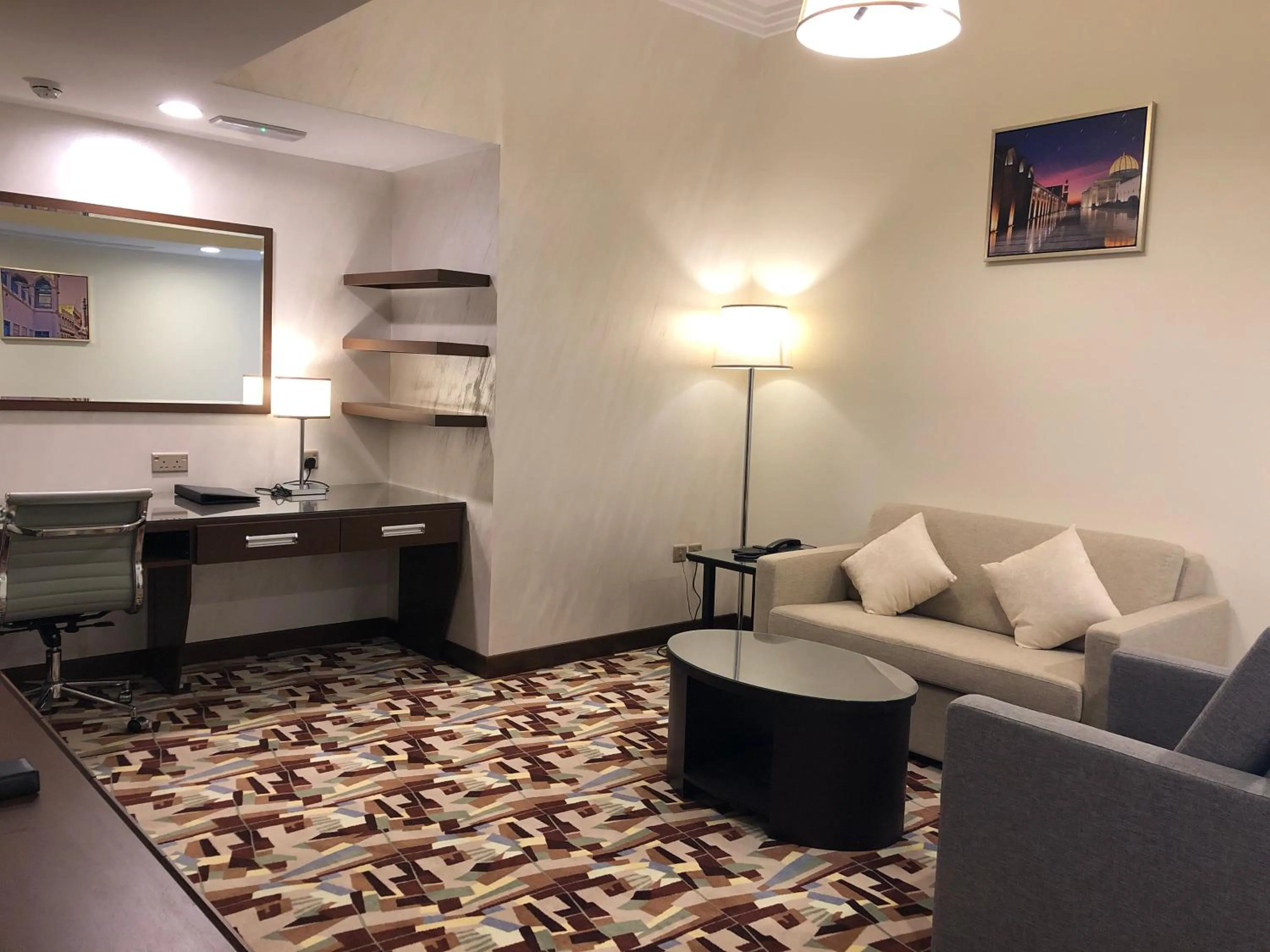 Communal lounge/ TV room in Al Murooj Grand Hotel