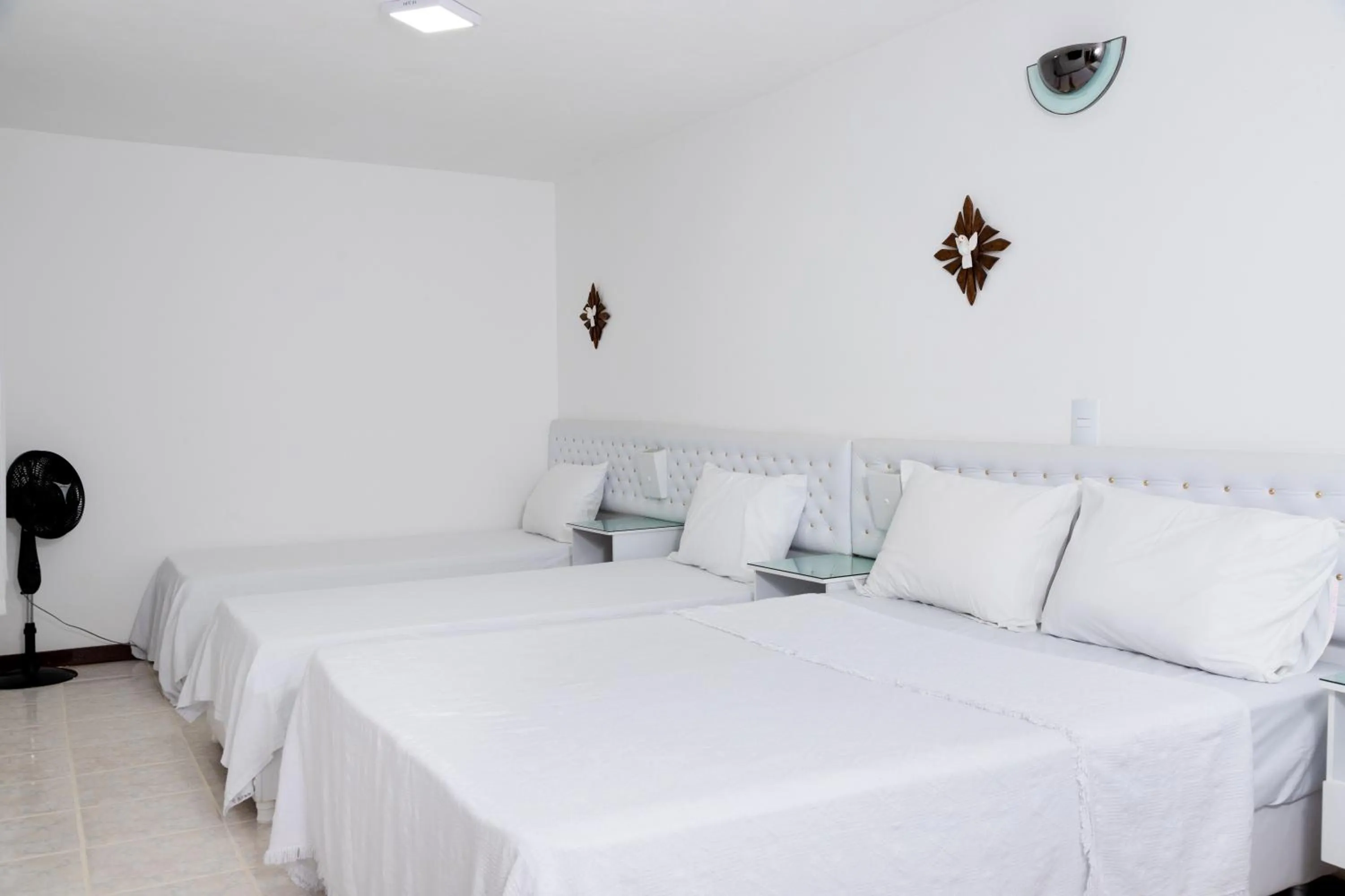 Bed in Pousada Brilho da Serra