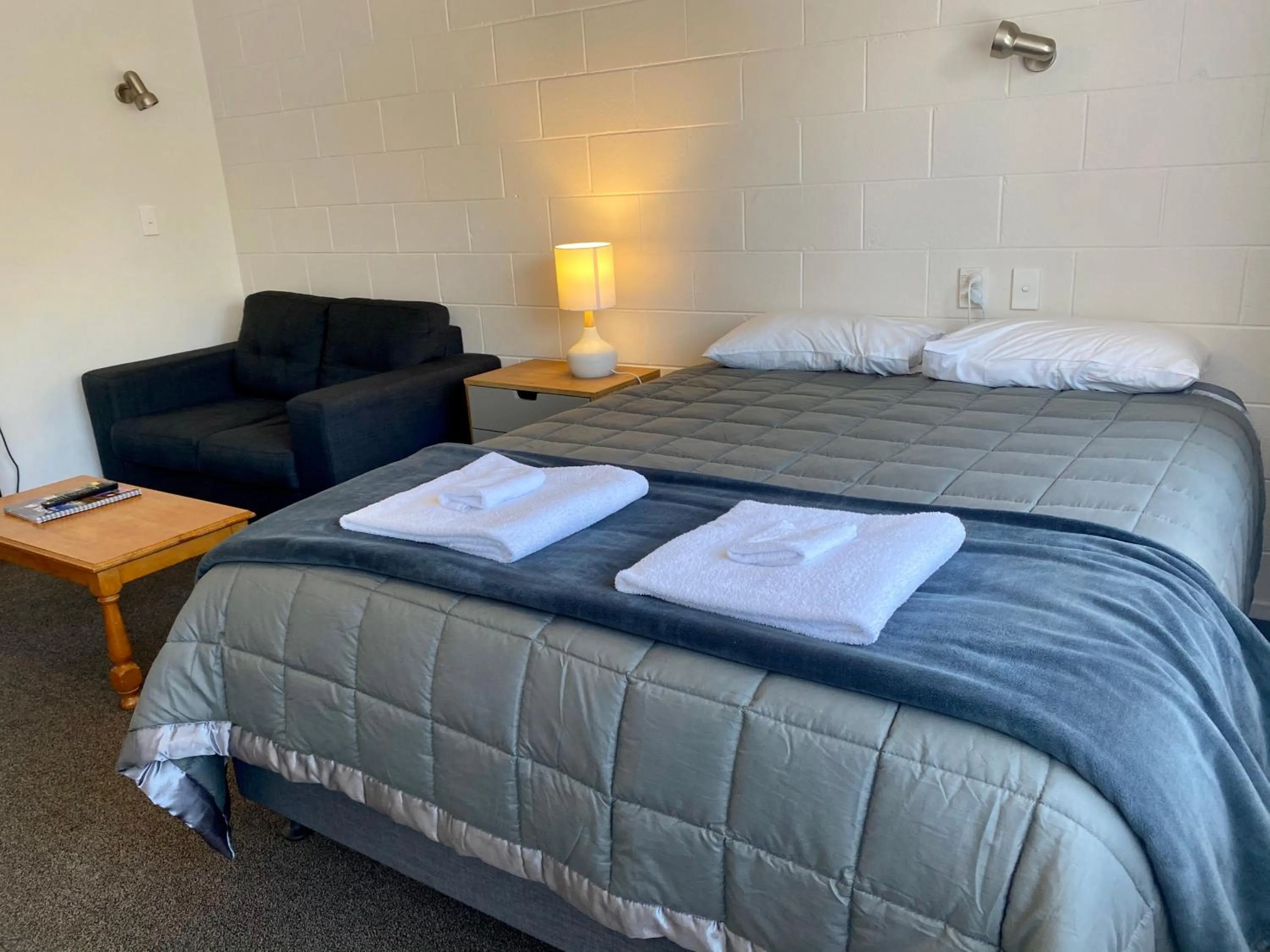 Bed in Beach Lodge Motels