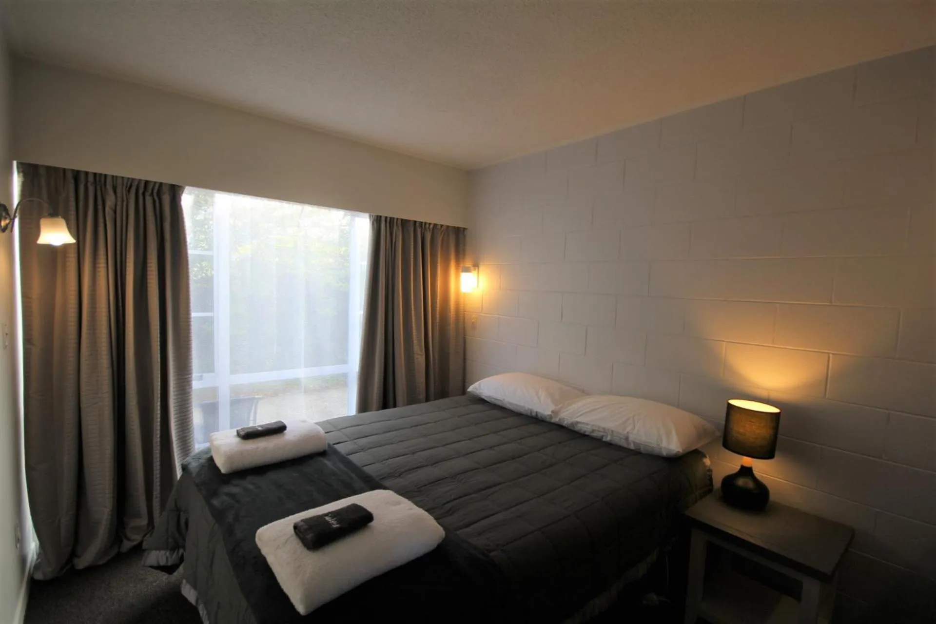 Bed in Beach Lodge Motels