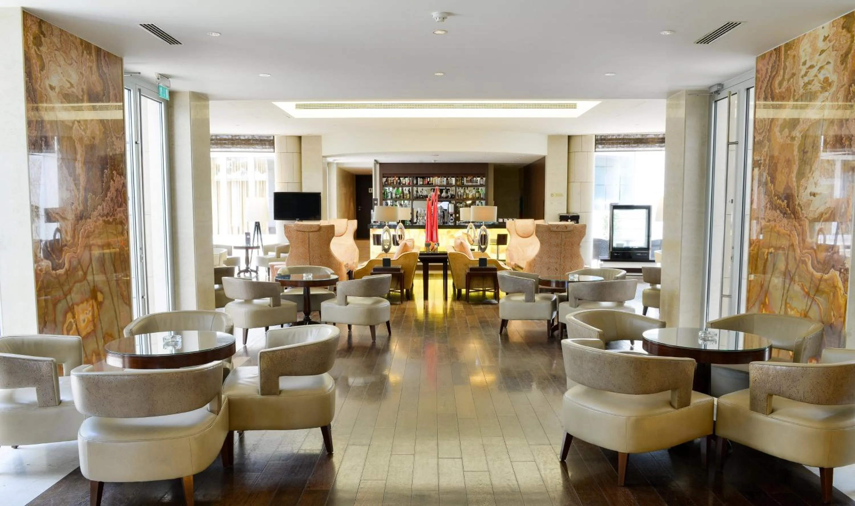 Lounge or bar in Crowne Plaza Bucharest by IHG