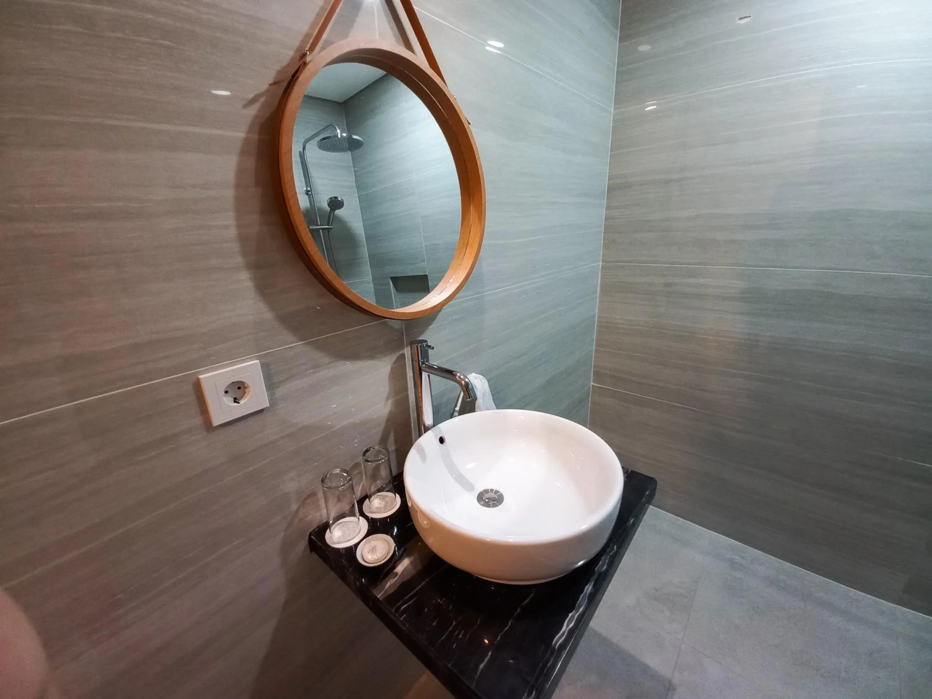 Bathroom in ABISHA Hotel Sanur