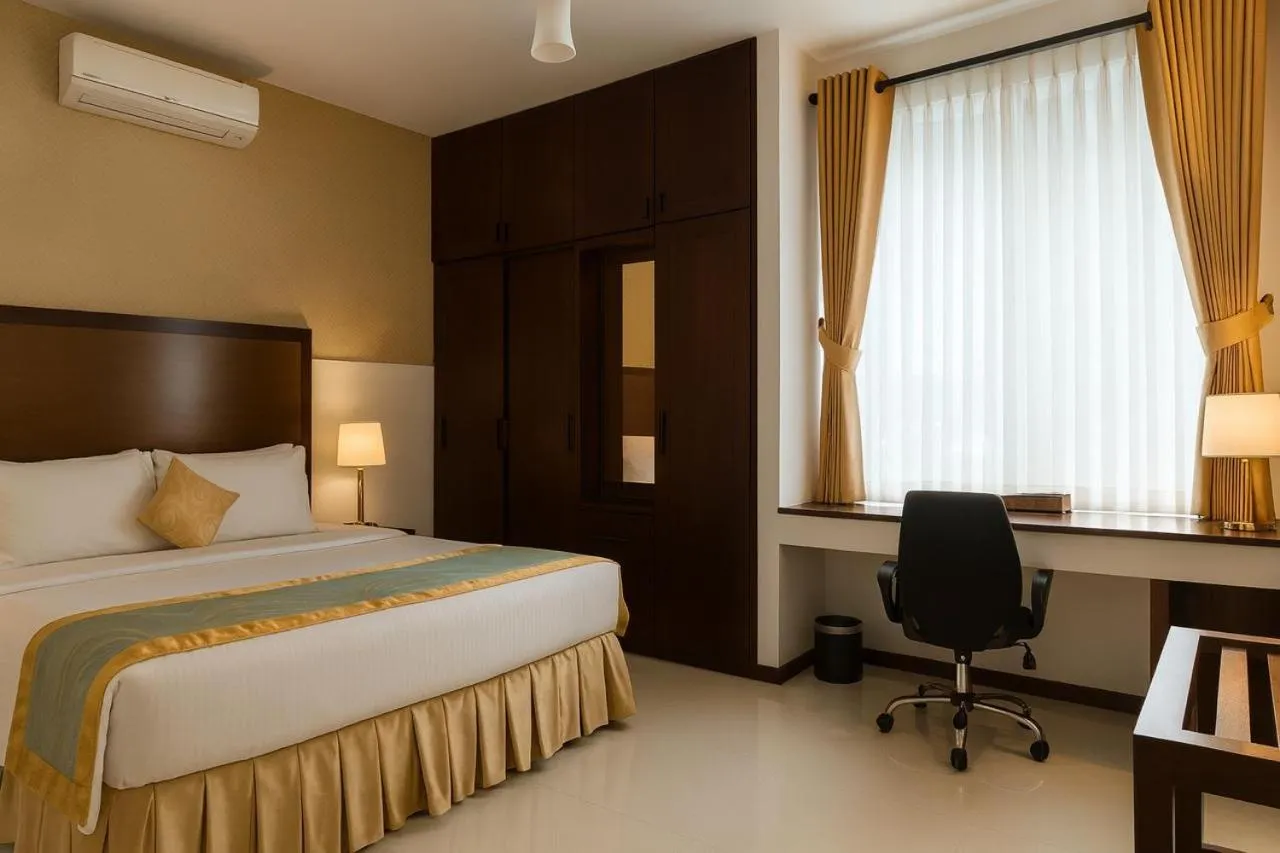 Bed in Unique Towers Luxury Boutique Suites