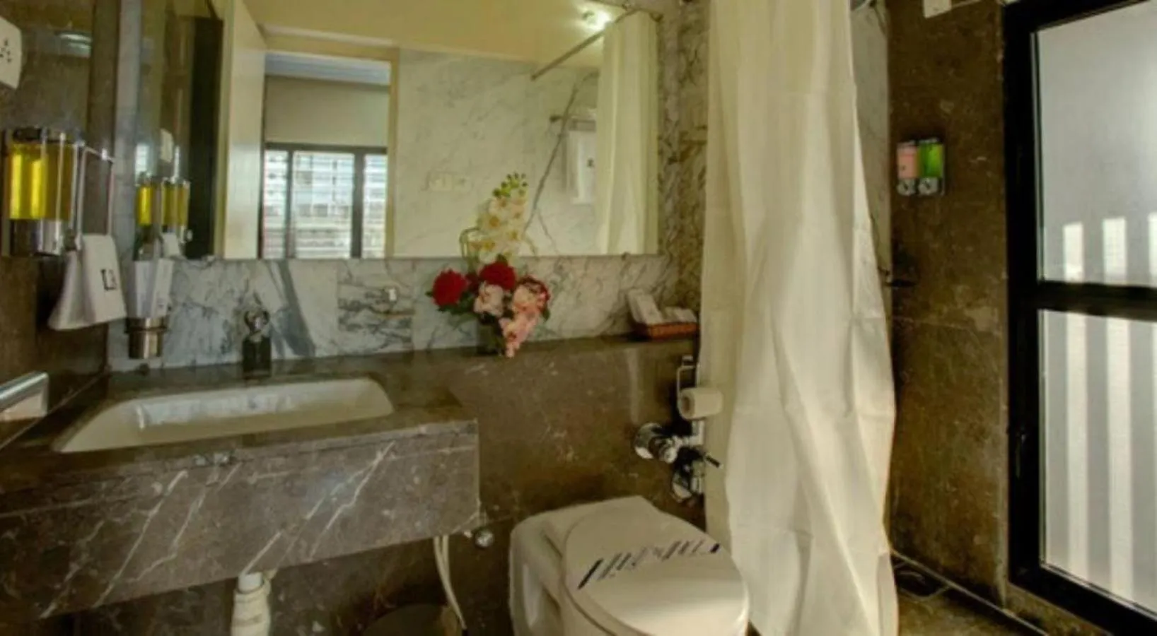 Bathroom in Lalco Residency