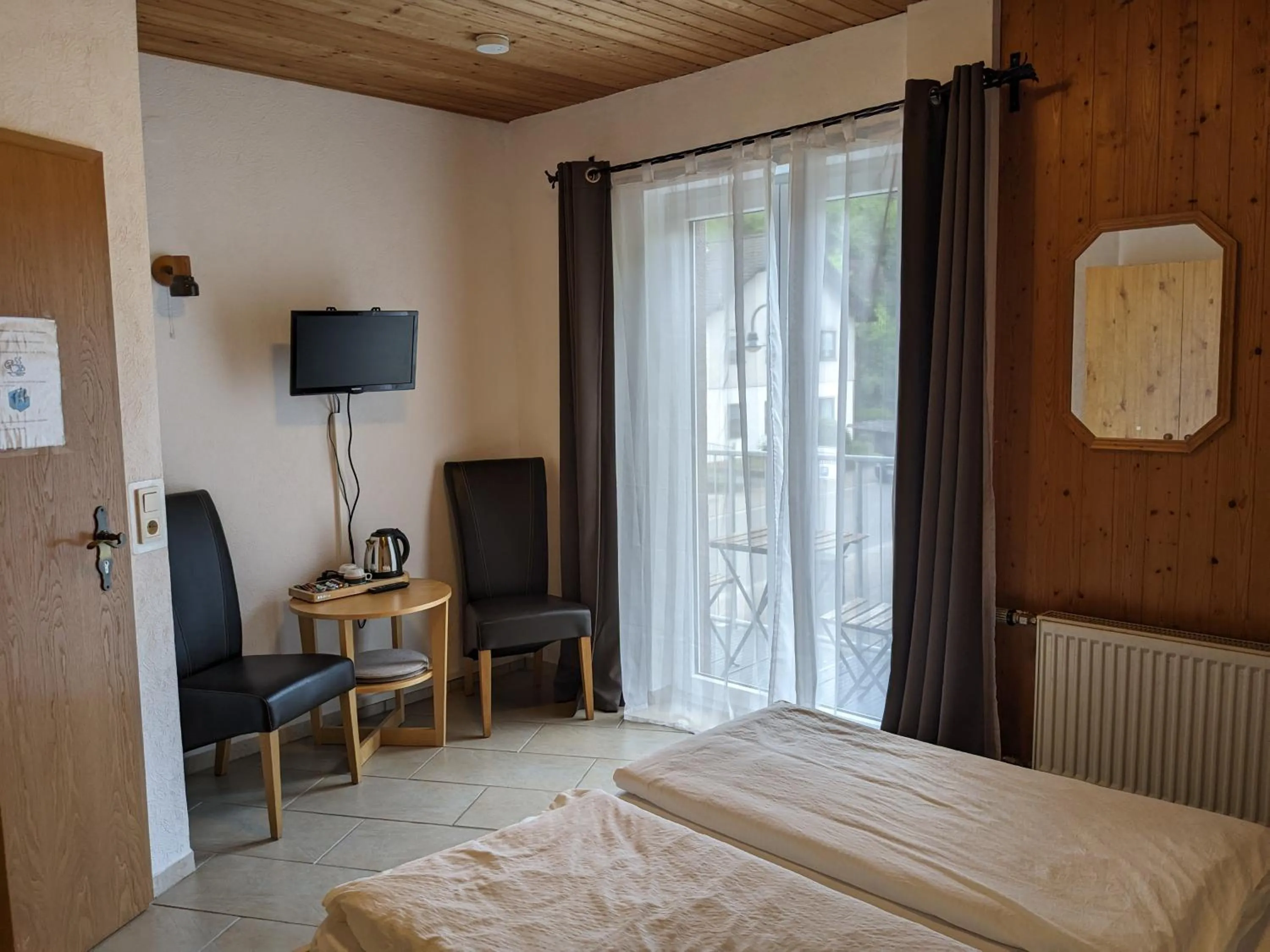 Bed in Hotel Pension Winzerhaus