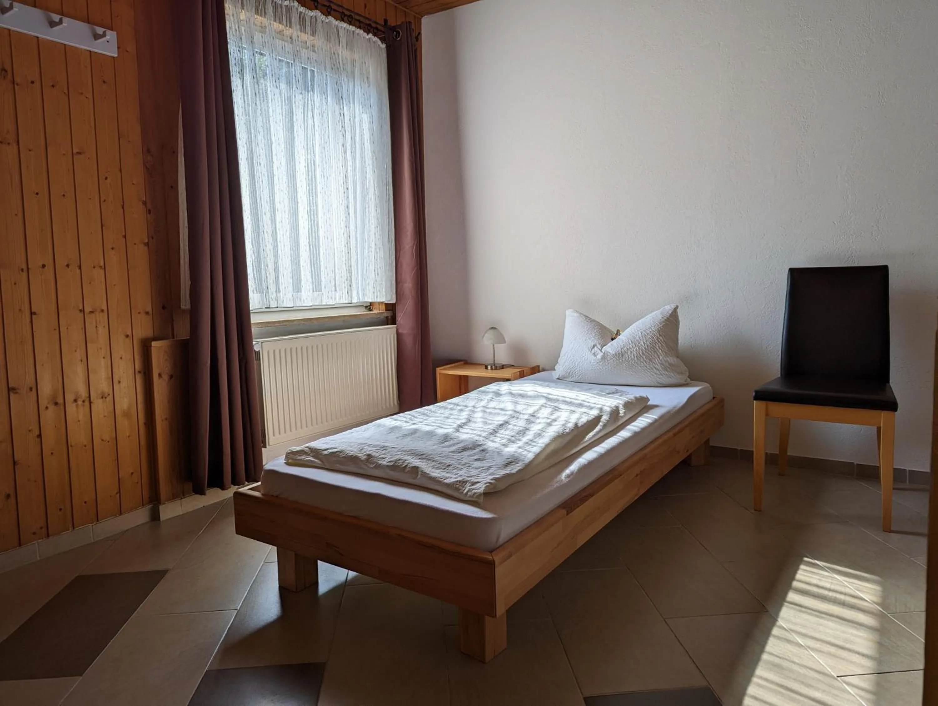Photo of the whole room, Bed in Hotel Pension Winzerhaus
