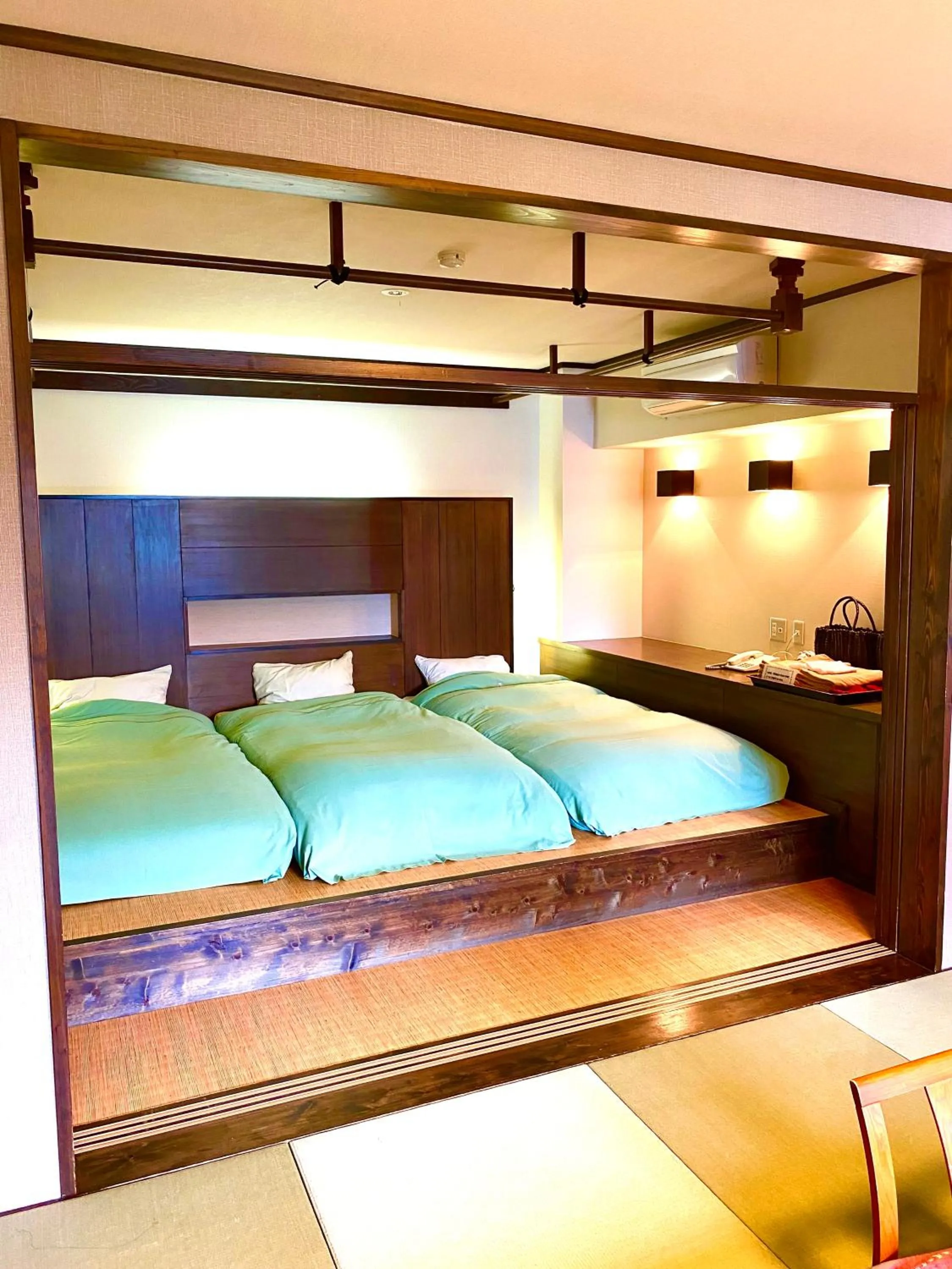 Bed in Inatori Akao Hotel