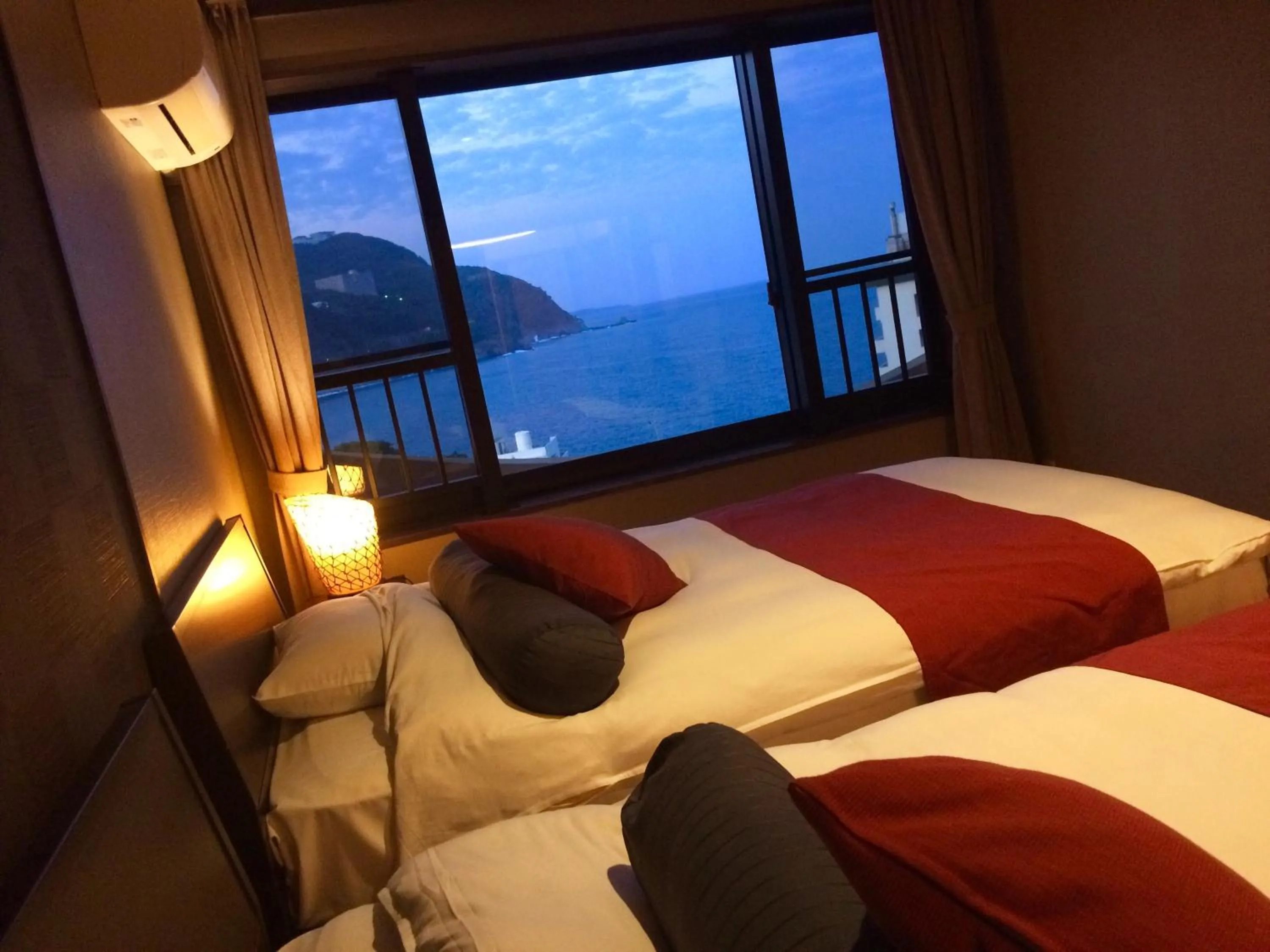 Bed in Inatori Akao Hotel